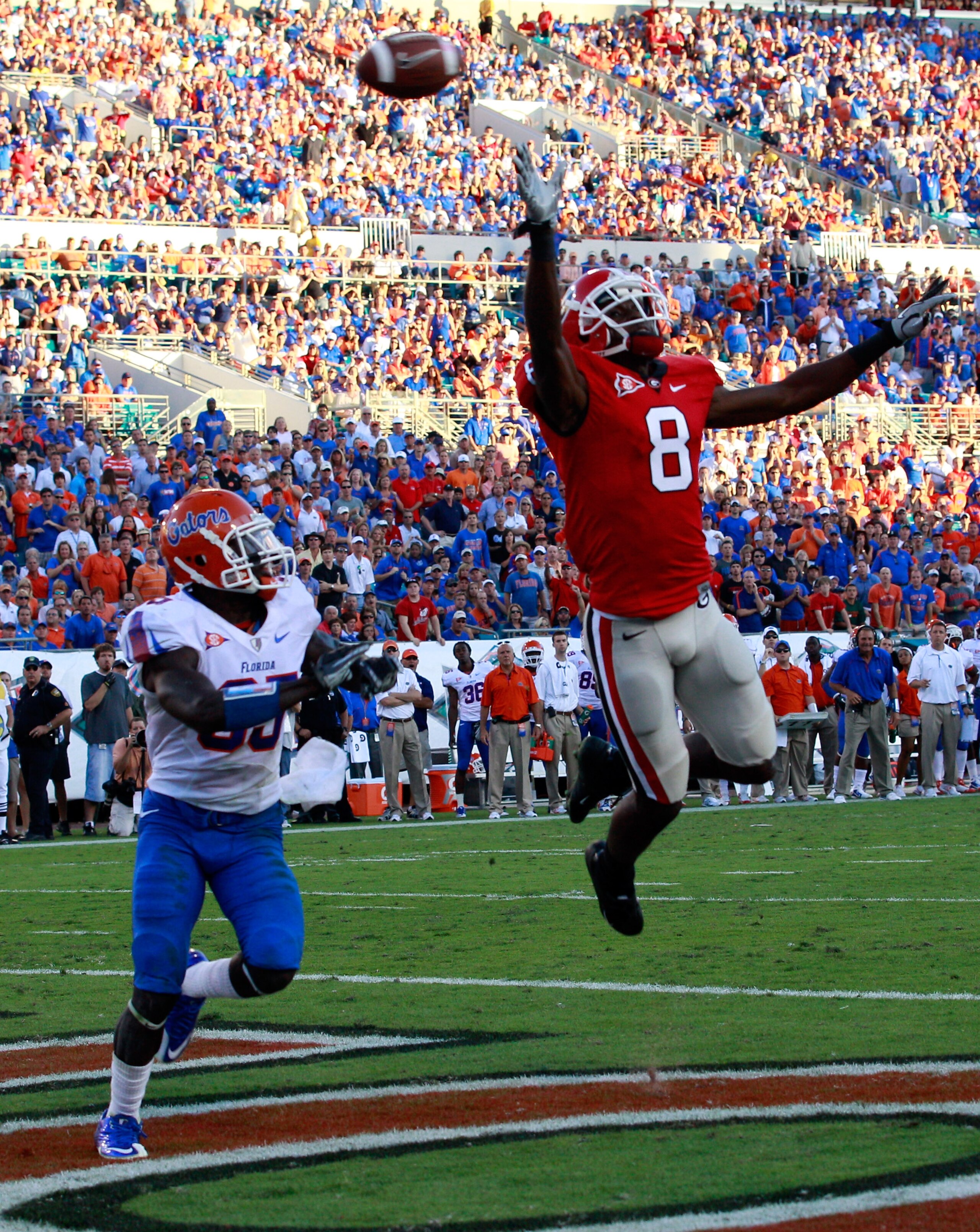 JACKSONVILLE, FL - OCTOBER 30:  A.J. Green #8 of the Georgia Bulldogs attempts to catch a pass against Ahmad Black #35 of the Florida Gators during the game at EverBank Field on October 30, 2010 in Jacksonville, Florida.  (Photo by Sam Greenwood/Getty Ima