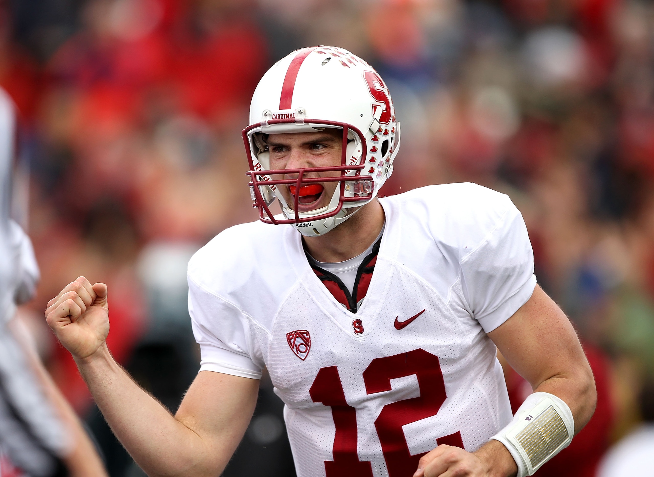 BERKELEY, CA - NOVEMBER 20:  Andrew Luck #12 of the Stanford Cardinal celebrates after the Cardinal scored a touchdown against the California Golden Bears at California Memorial Stadium on November 20, 2010 in Berkeley, California.  (Photo by Ezra Shaw/Ge