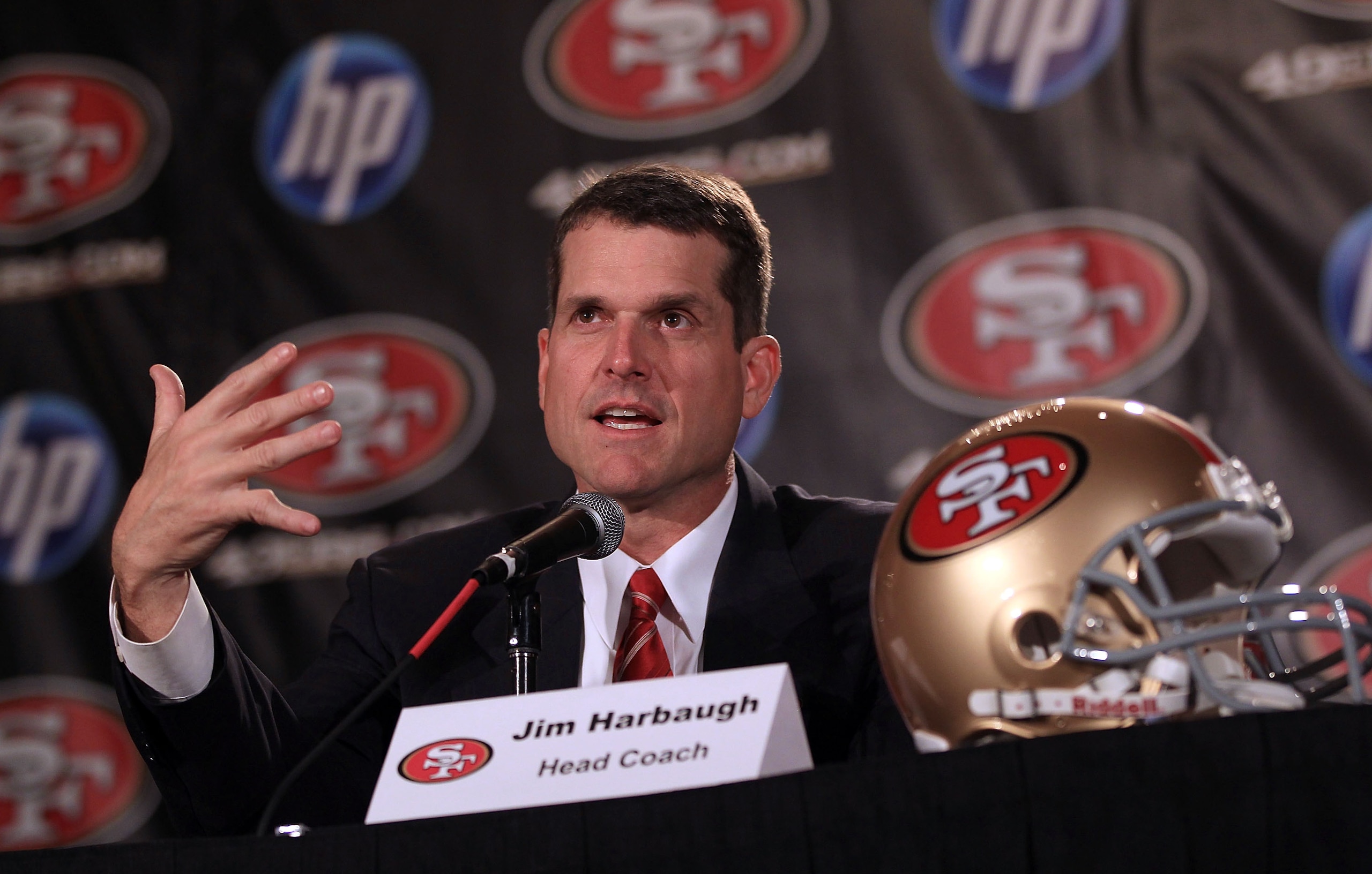 SAN FRANCISCO, CA - JANUARY 07:  Jim Harbaugh speaks at a press conference where he was introduced as the new San Francisco 49ers head coach at the Palace Hotel on January 7, 2011 in San Francisco, California.  (Photo by Ezra Shaw/Getty Images)