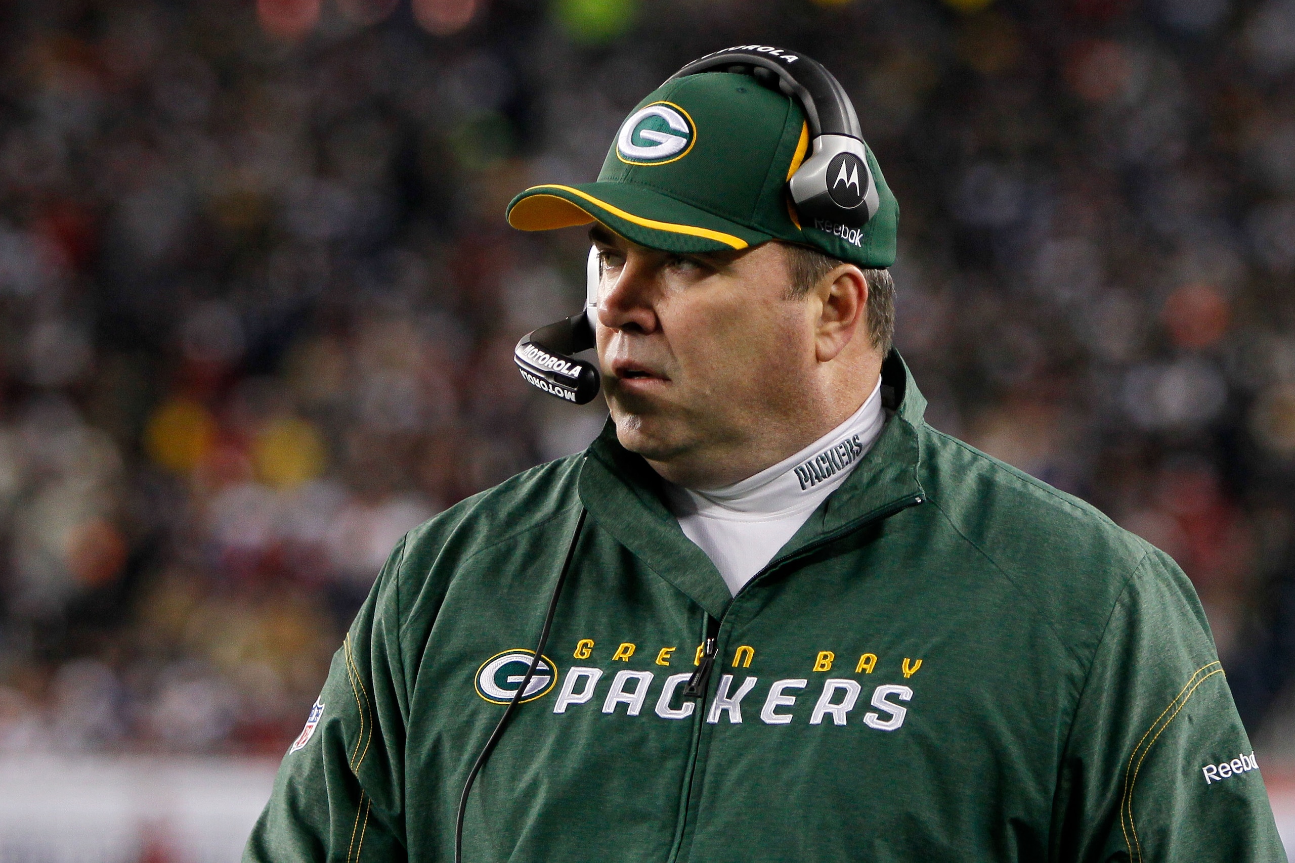 FOXBORO, MA - DECEMBER 19:  Mike McCarthy, head coach of the Green Bay Packers, looks on during the first quarter of the game against the New England Patriots at Gillette Stadium on December 19, 2010 in Foxboro, Massachusetts. The Patriots won the game 31