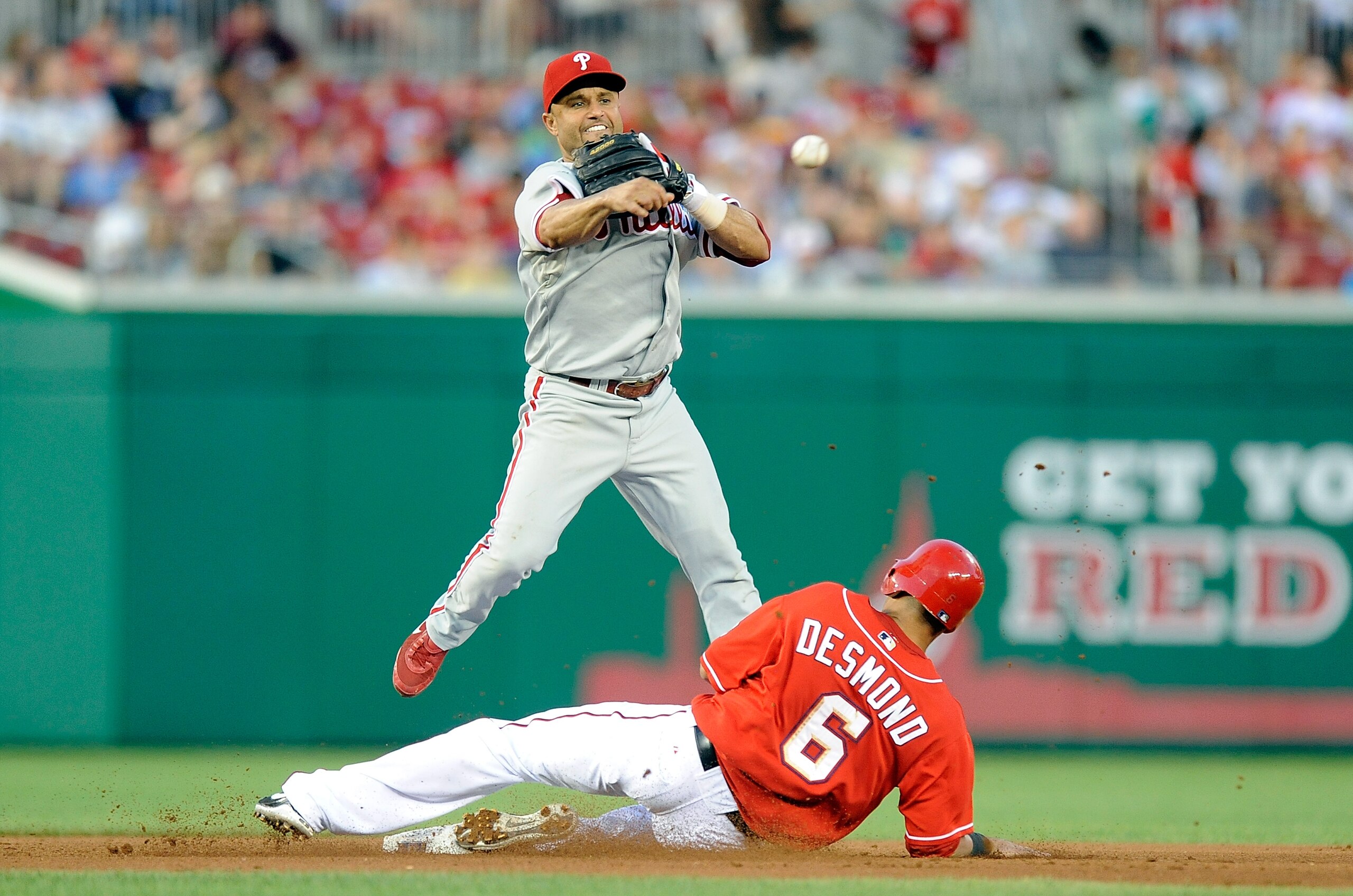 WASHINGTON - JULY 30: Placido Polanco #27 of the Philadelphia Phillies forces out Ian Desmond #6 of the Washington Nationals to start a double play at Nationals Park on July 30, 2010 in Washington, DC. (Photo by Greg Fiume/Getty Images) WASHINGTON - JULY 30: Placido Polanco #27 of the Philadelphia Phillies forces out Ian Desmond #6 of the Washington Nationals to start a double play at Nationals Park on July 30, 2010 in Washington, DC. (Photo by Greg Fiume/Getty Images)