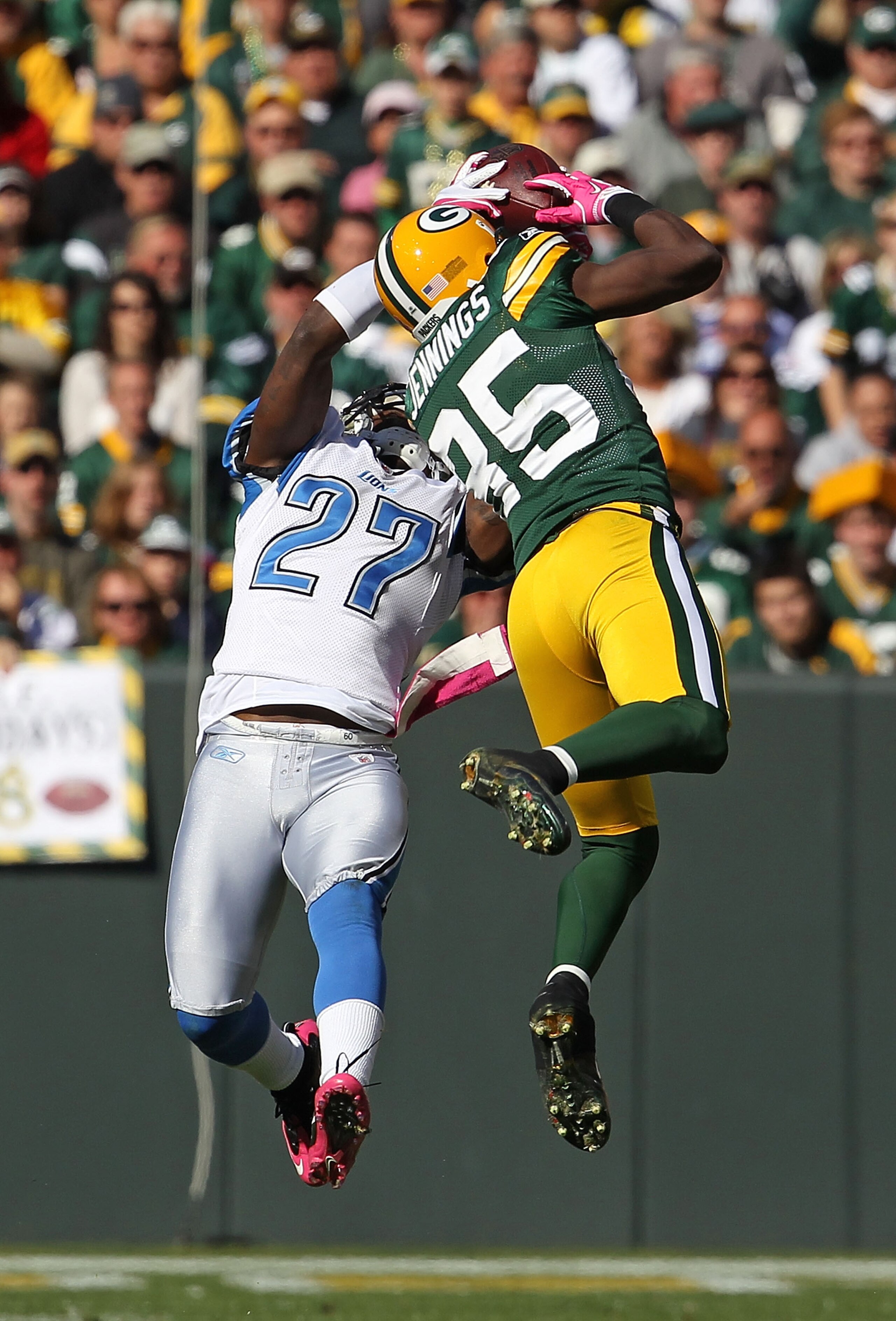 GREEN BAY, WI - OCTOBER 03: Alphonso Smith #27 of the Detroit Lions takes the ball away from Greg Jennings #85 of the Green Bay Packers for an interception at Lambeau Field on October 3, 2010 in Green Bay, Wisconsin. The Packers defeated the Lions 28-26. GREEN BAY, WI - OCTOBER 03: Alphonso Smith #27 of the Detroit Lions takes the ball away from Greg Jennings #85 of the Green Bay Packers for an interception at Lambeau Field on October 3, 2010 in Green Bay, Wisconsin. The Packers defeated the Lions 28-26.