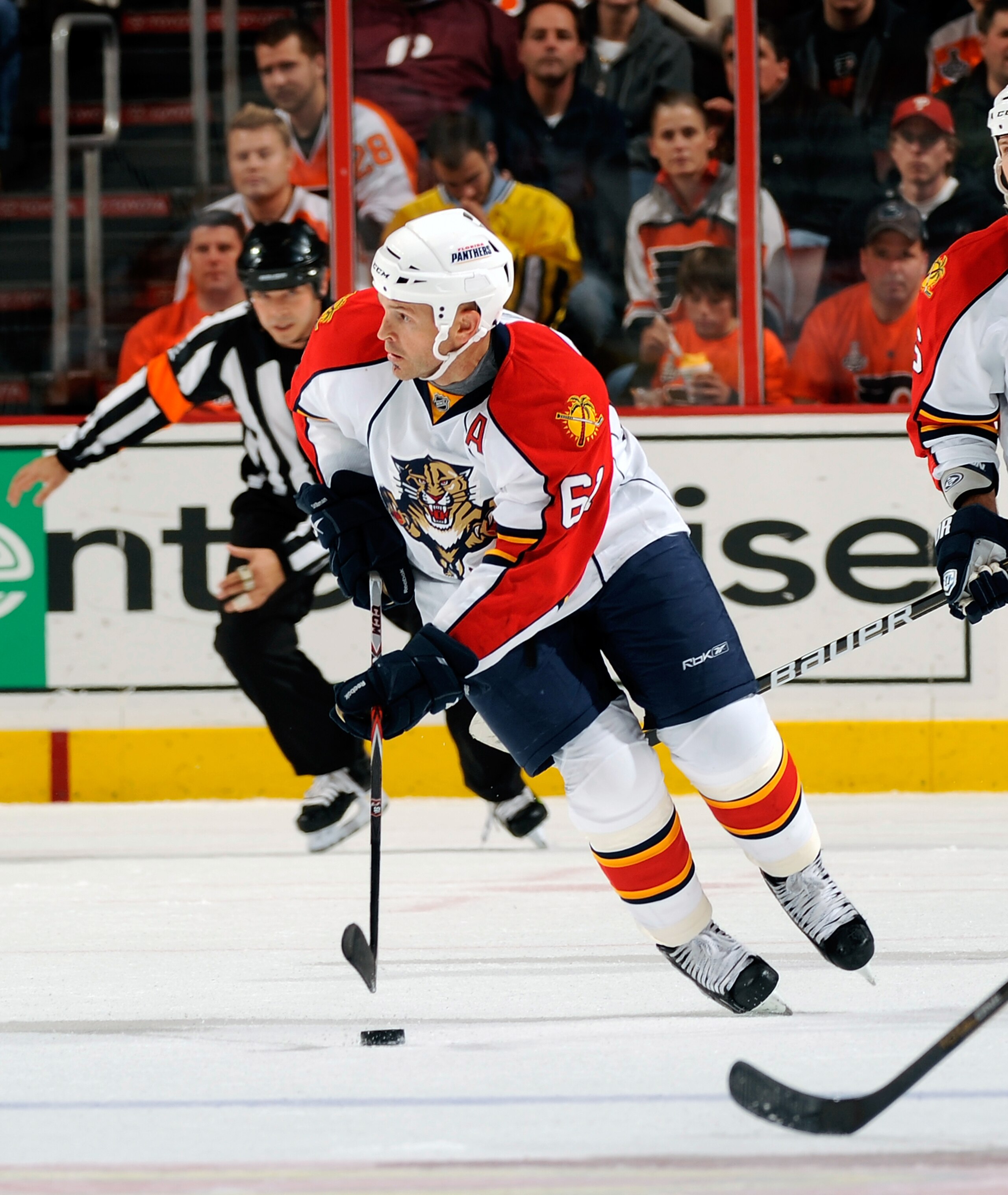 PHILADELPHIA - NOVEMBER 13:  Cory Stillman #61 of the Florida Panthers skates with the puck in a game against the Philadelphia Flyers on November 13, 2010 in Philadelphia, Pennsylvania.  (Photo by Lou Capozzola/Getty Images)