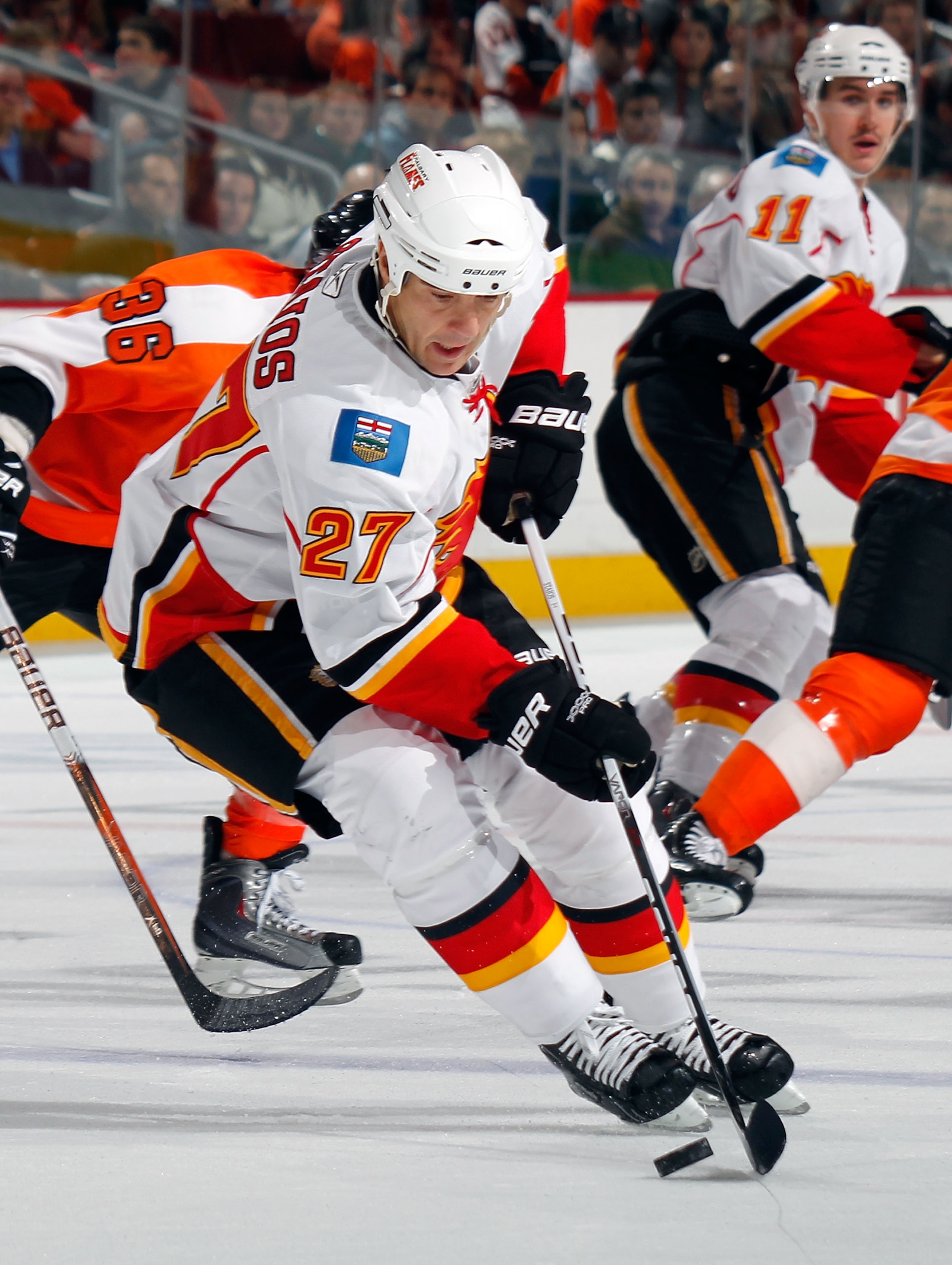 PHILADELPHIA - NOVEMBER 26:  Steve Staios #27 of the Calgary Flames in action during a hockey game against the Philadelphia Flyers at the Wells Fargo Center on November 26, 2010 in Philadelphia, Pennsylvania.  The Flames won 3-2. (Photo by Paul Bereswill/