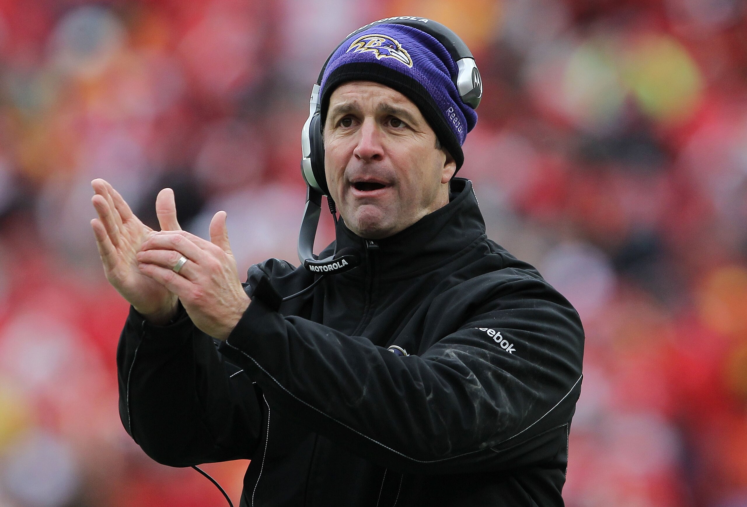 KANSAS CITY, MO - JANUARY 09:  Head coach John Harbaugh of the Baltimore Ravens calls timeout during their 2011 AFC wild card playoff game against the Kansas City Chiefs at Arrowhead Stadium on January 9, 2011 in Kansas City, Missouri.  (Photo by Doug Pen