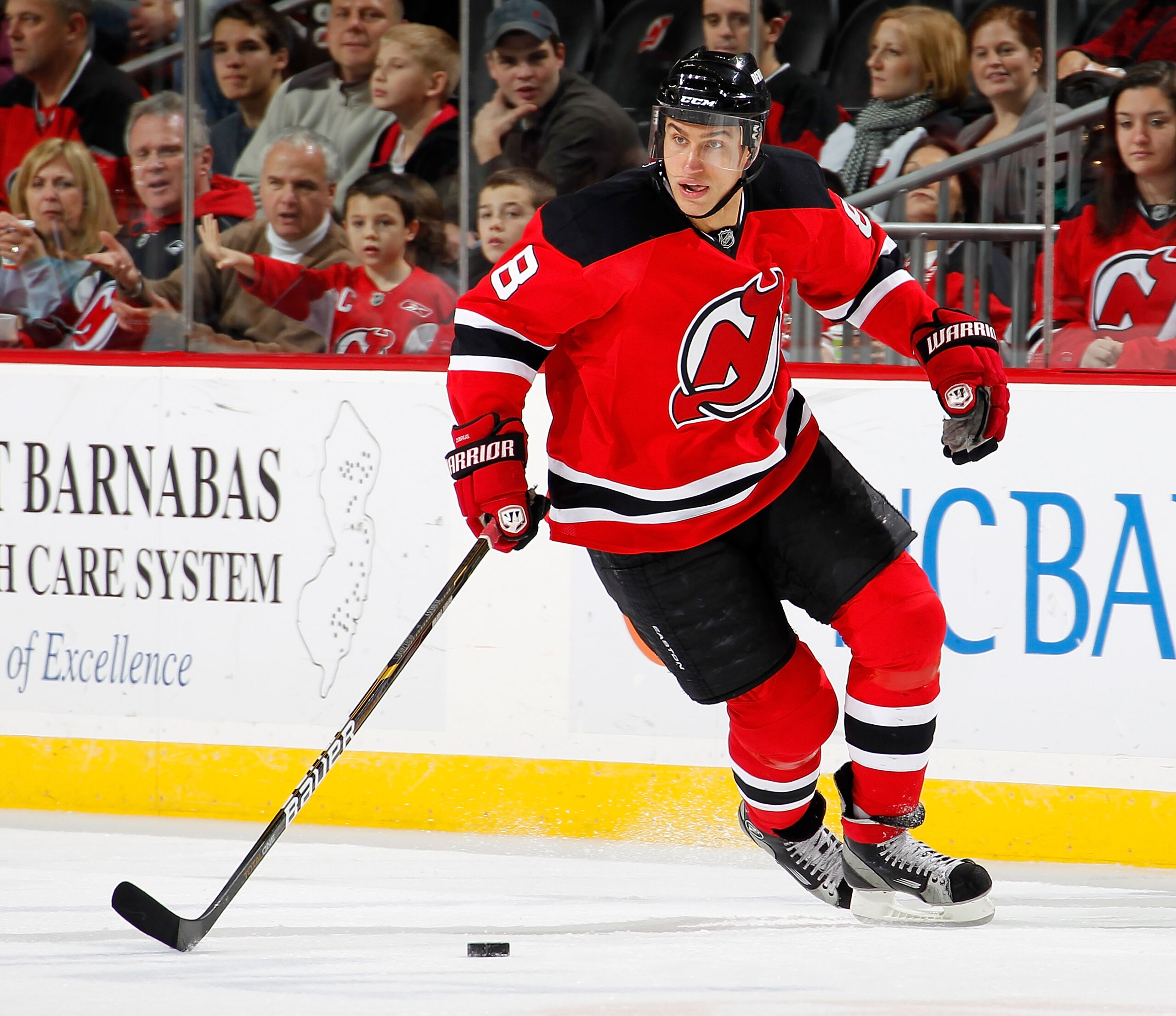NEWARK, NJ - JANUARY 09: Dainius Zubrus #8 of the New Jersey Devils skates during an NHL hockey game against the Tampa Bay Lightning at the Prudential Center on January 9, 2011 in Newark, New Jersey.  (Photo by Paul Bereswill/Getty Images)