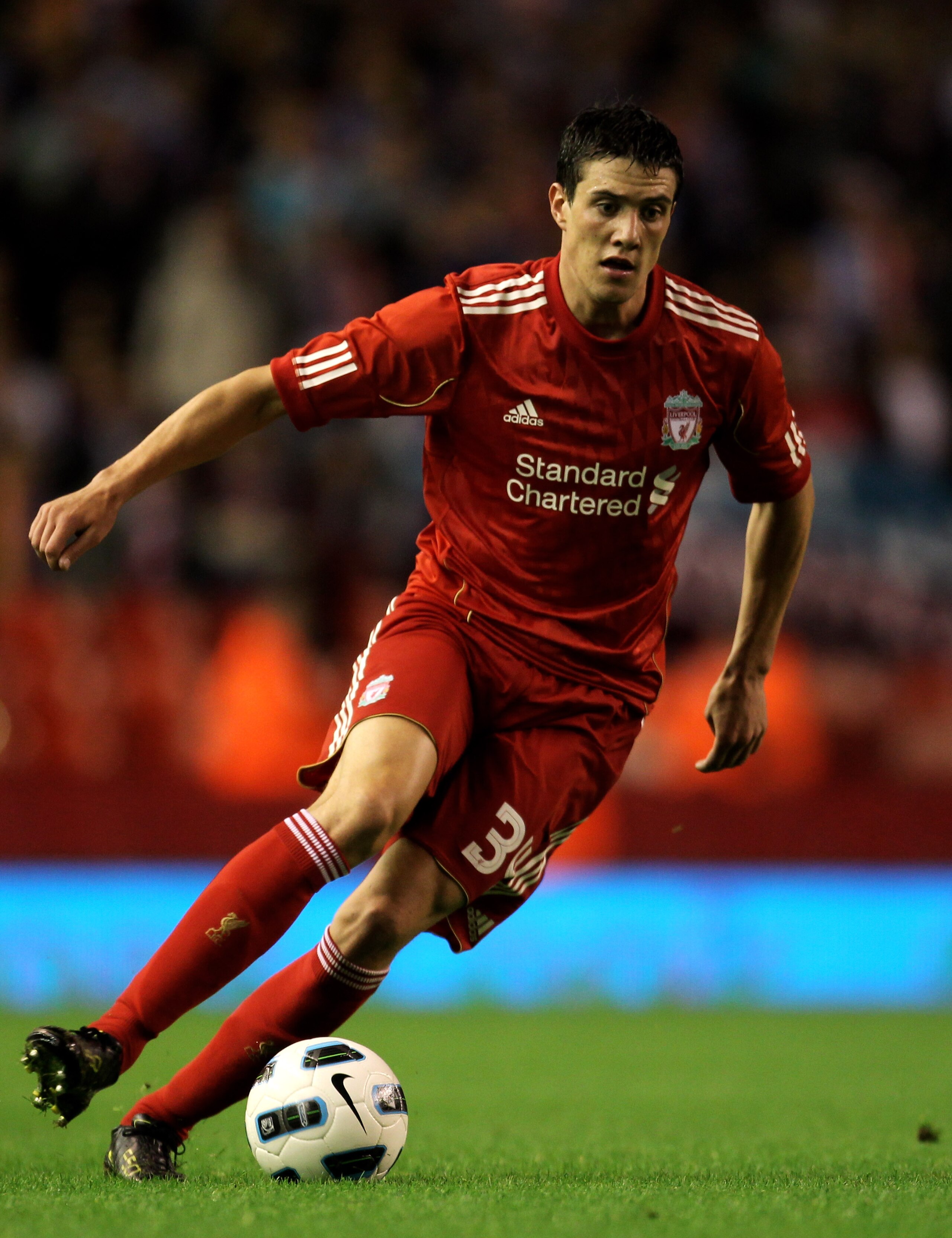 LIVERPOOL, ENGLAND - AUGUST 19:  Martin Kelly of Liverpool in action during the UEFA Europa League play-off first leg match beteween Liverpool and Trabzonspor at Anfield on August 19, 2010 in Liverpool, England.  (Photo by Alex Livesey/Getty Images)