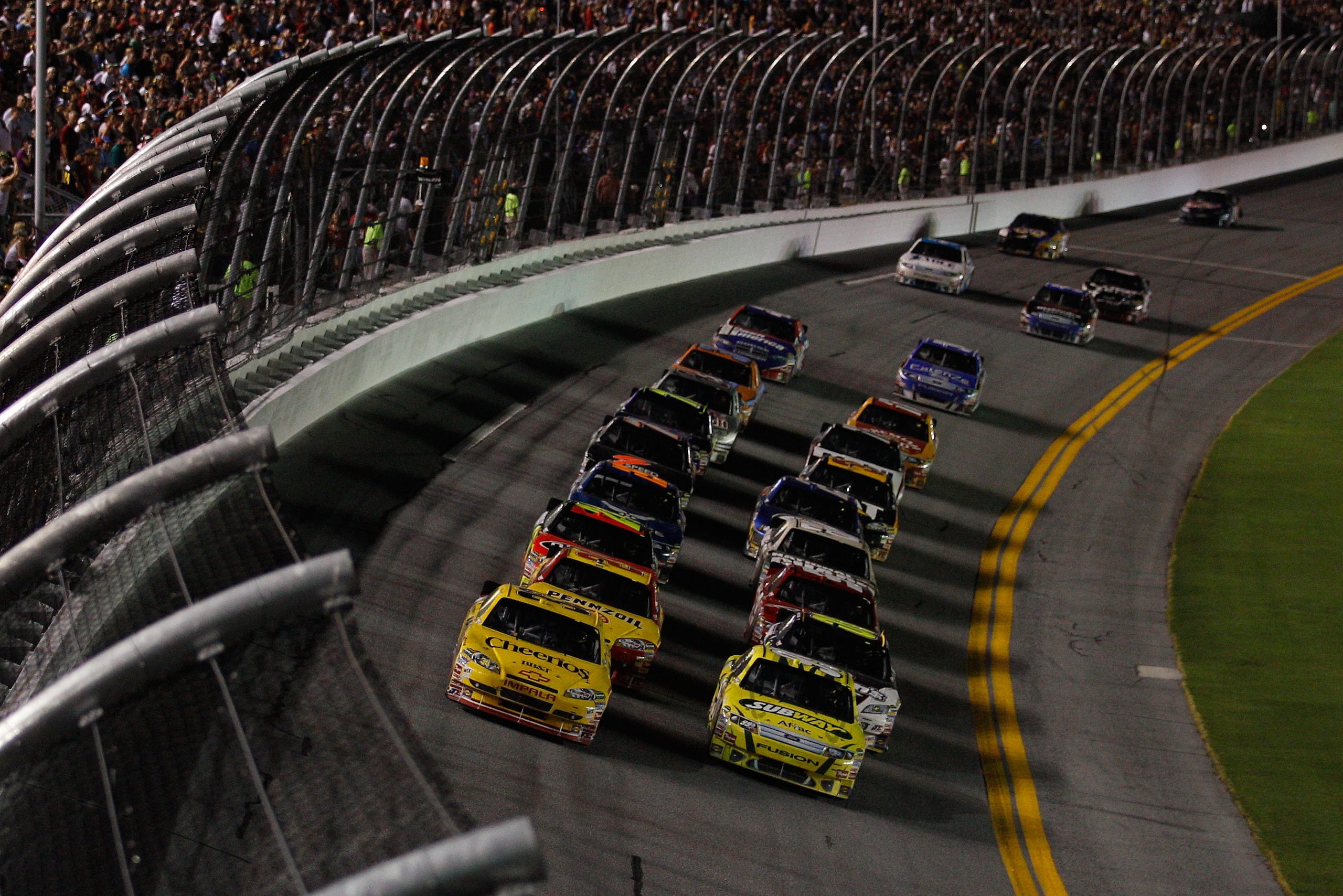 DAYTONA BEACH, FL - JULY 03:  Clint Bowyer, driver of the #33 Cheerios/Hamburger Helper Chevrolet, leads the field during the NASCAR Sprint Cup Series Coke Zero 400 at Daytona International Speedway on July 3, 2010 in Daytona Beach, Florida.  (Photo by Ch
