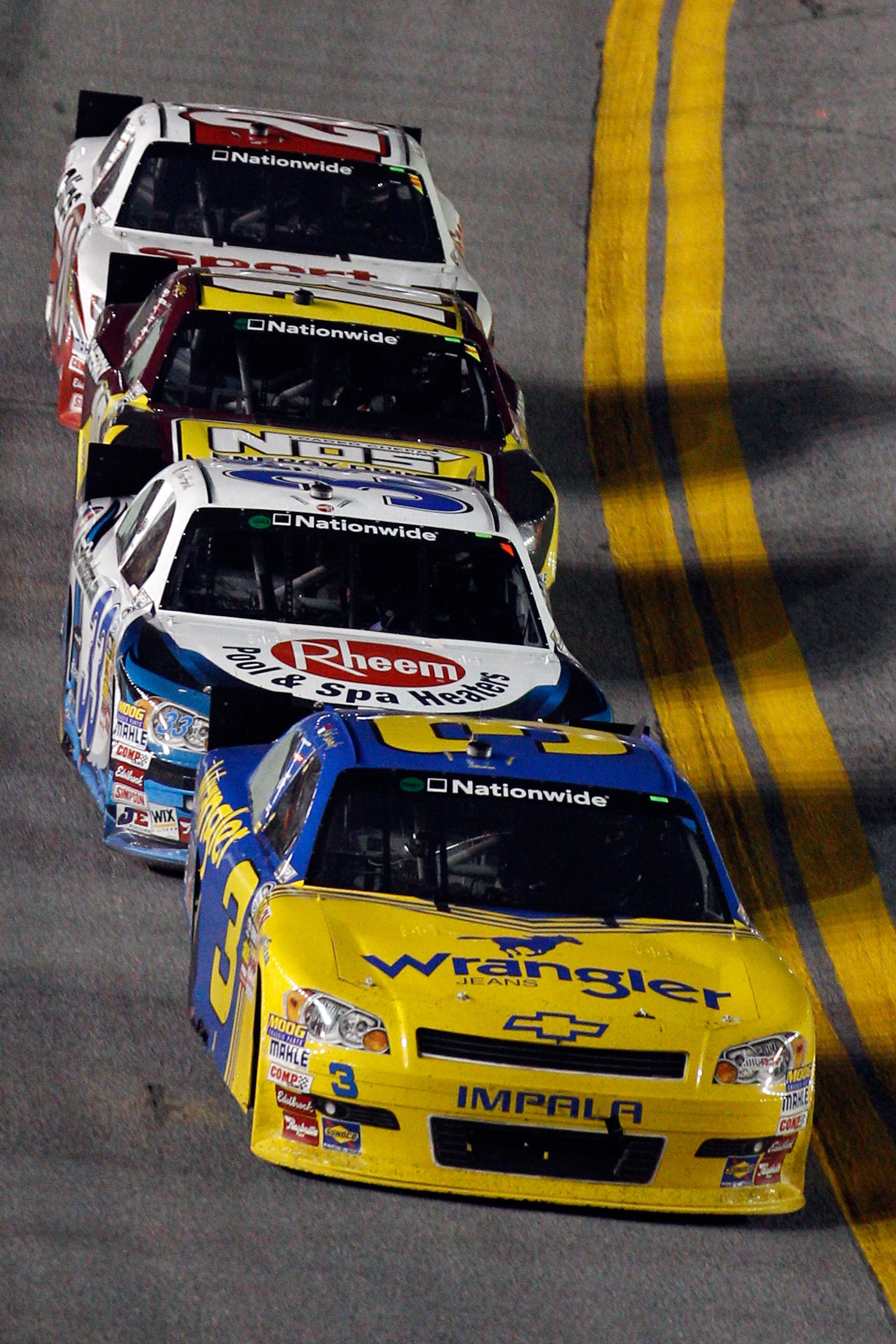 DAYTONA BEACH, FL - JULY 02:  Dale Earnhardt Jr., driver of the #3 Wrangler Chevrolet leads the field near the end of the race during the NASCAR Nationwide Series Subway Jalapeno 250 at Daytona International Speedway on July 2, 2010 in Daytona Beach, Flor