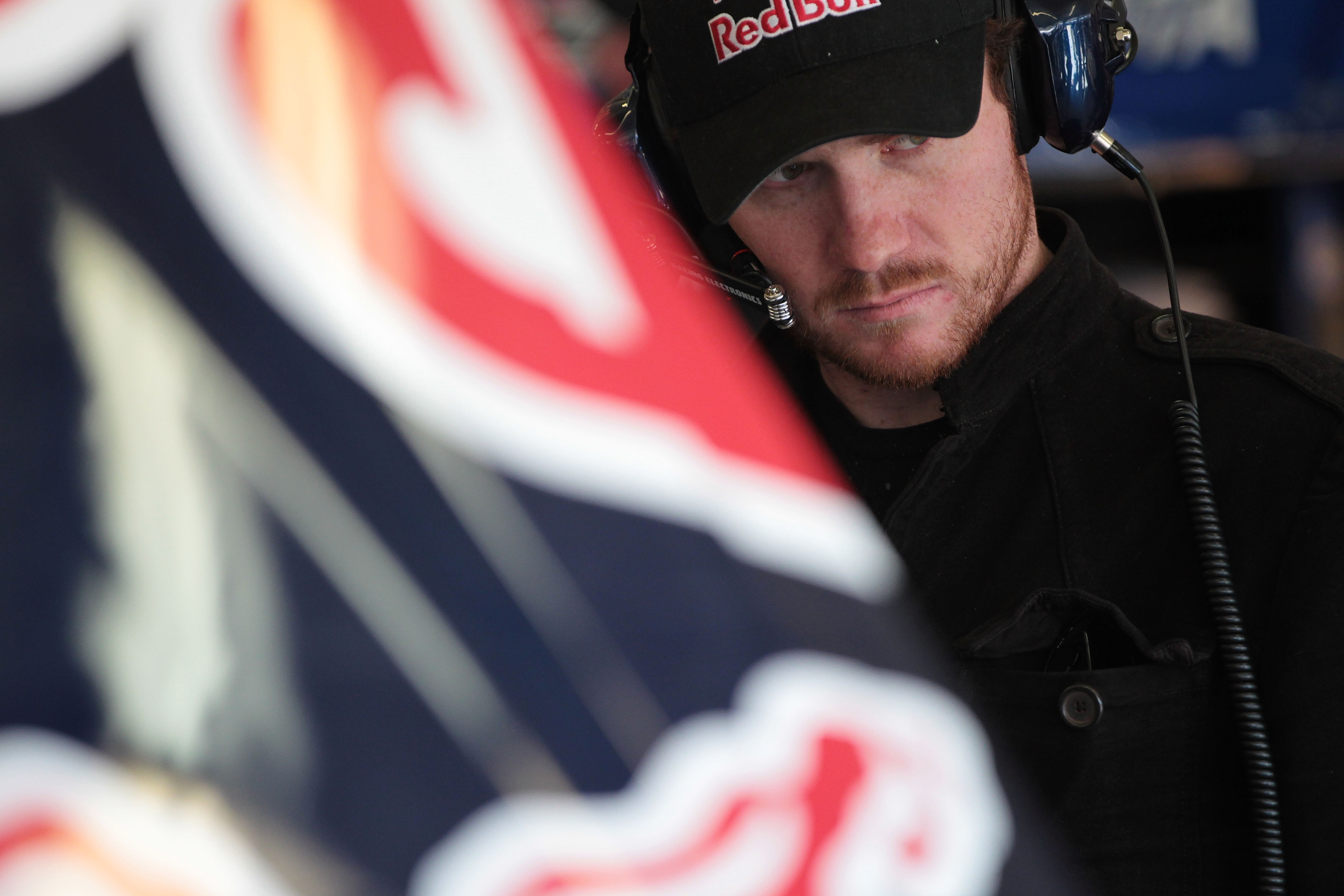 FORT WORTH, TX - NOVEMBER 05:  Driver Brian Vickers stands in the garage during practice for the NASCAR Sprint Cup Series AAA Texas 500 at Texas Motor Speedway on November 5, 2010 in Fort Worth, Texas.  (Photo by Jamie Squire/Getty Images)