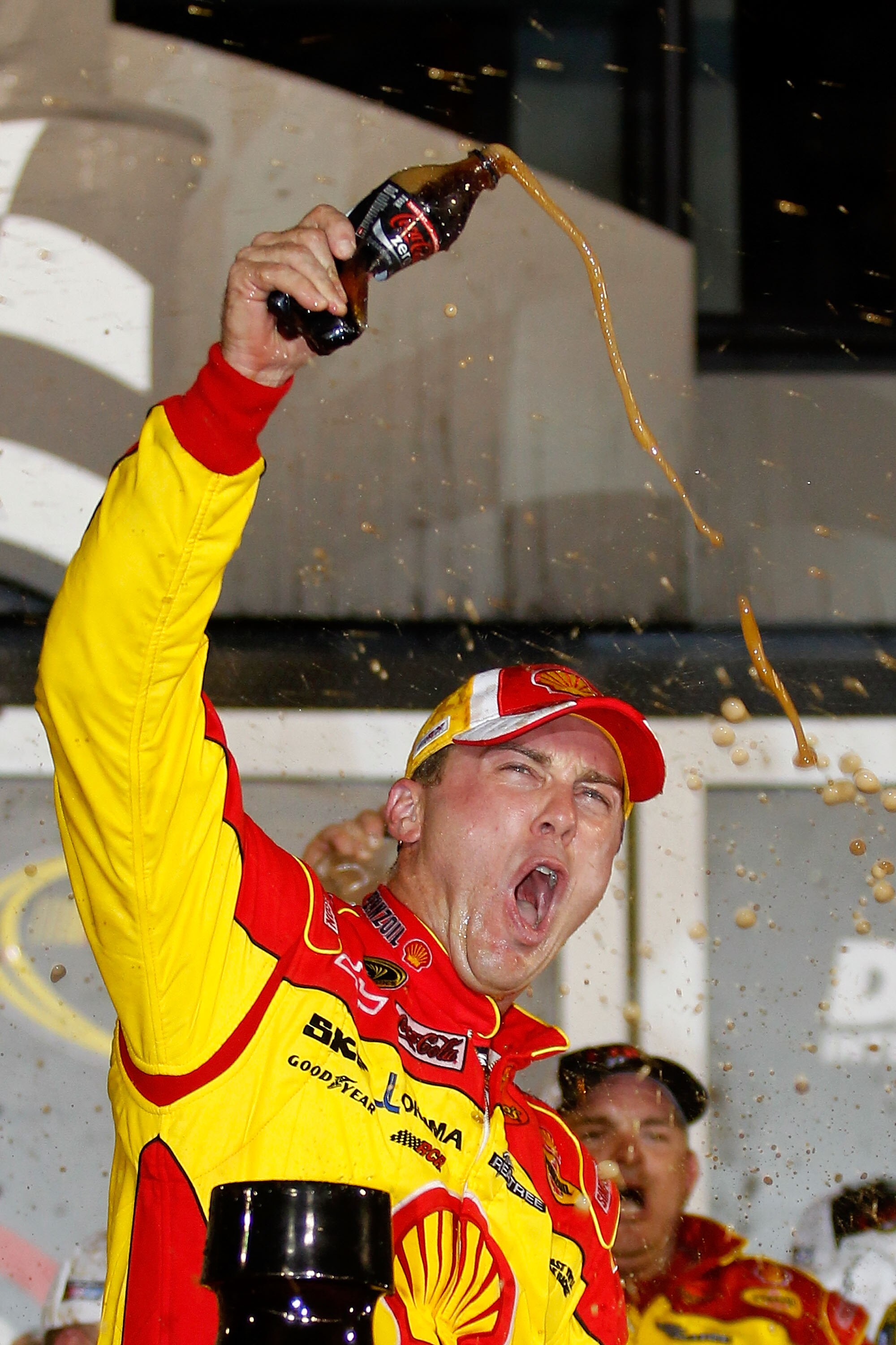 DAYTONA BEACH, FL - JULY 03:  Kevin Harvick, driver of the #29 Shell/Pennzoil Chevrolet, celebrates in victory lane after winning the NASCAR Sprint Cup Series Coke Zero 400 at Daytona International Speedway on July 3, 2010 in Daytona Beach, Florida.  (Pho