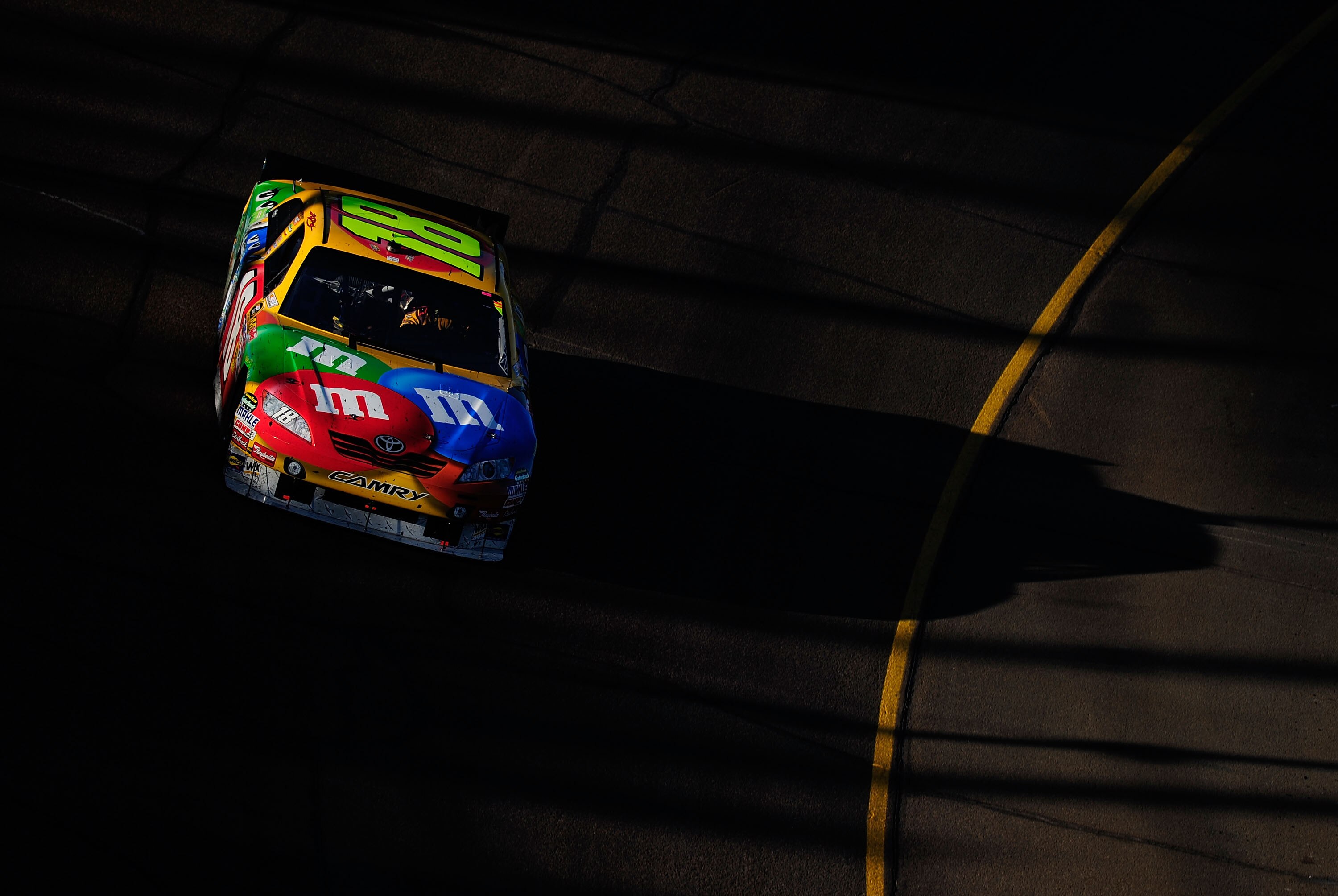 AVONDALE, AZ - NOVEMBER 14:  Kyle Busch, driver of the #18 M&M'sToyota, races during the NASCAR Sprint Cup Series Kobalt Tools 500 at Phoenix International Raceway on November 14, 2010 in Avondale, Arizona.  (Photo by Robert Laberge/Getty Images for NASCA