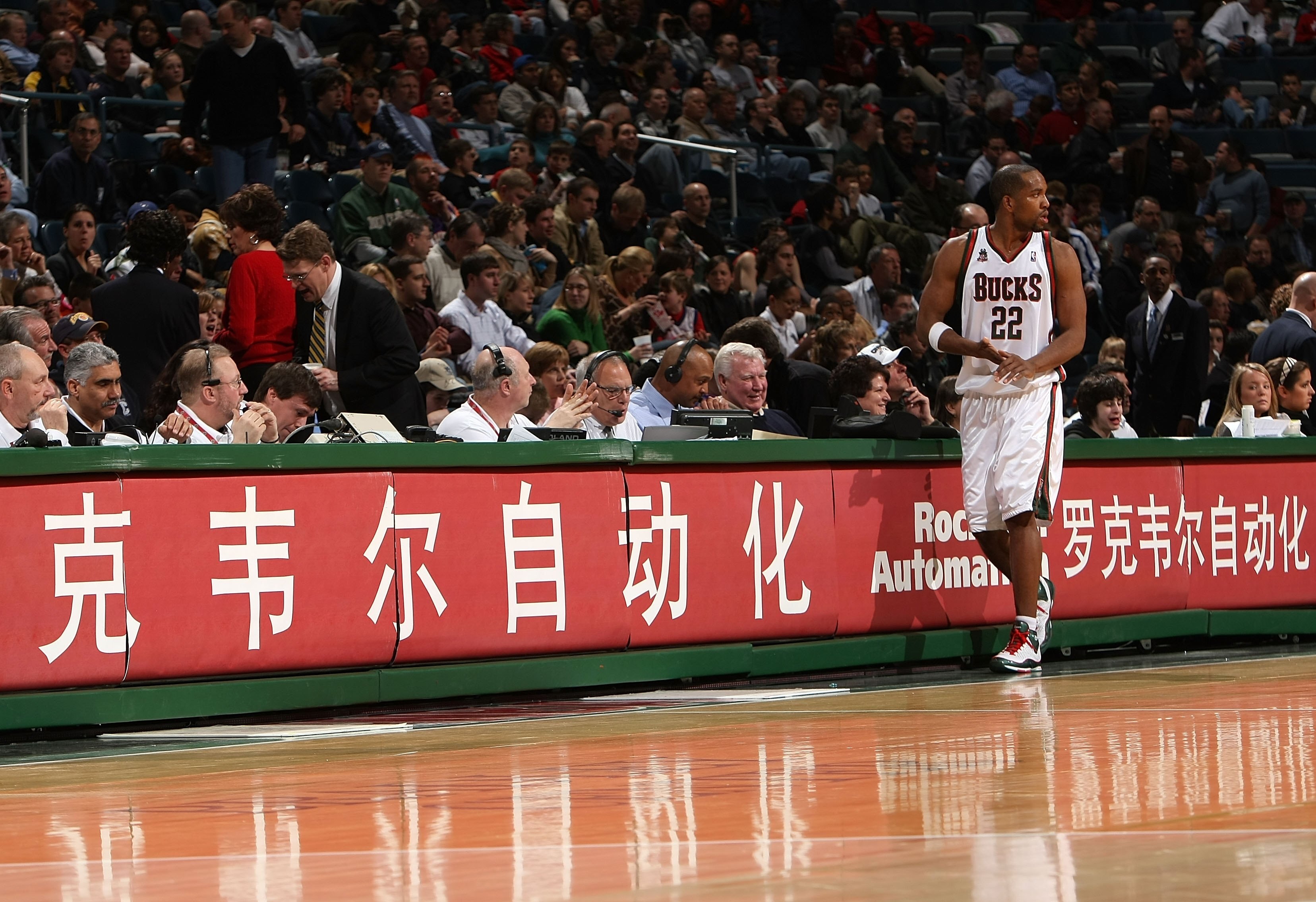 MILWAUKEE - JANUARY 22:  Michael Redd of the Milwaukee Bucks walks in front of the scores' table as he gets set to check back into the game against the Phoenix Suns at the Bradley Center on January 22, 2008 in Milwaukee, Wisconsin.  NOTE TO USER: User exp