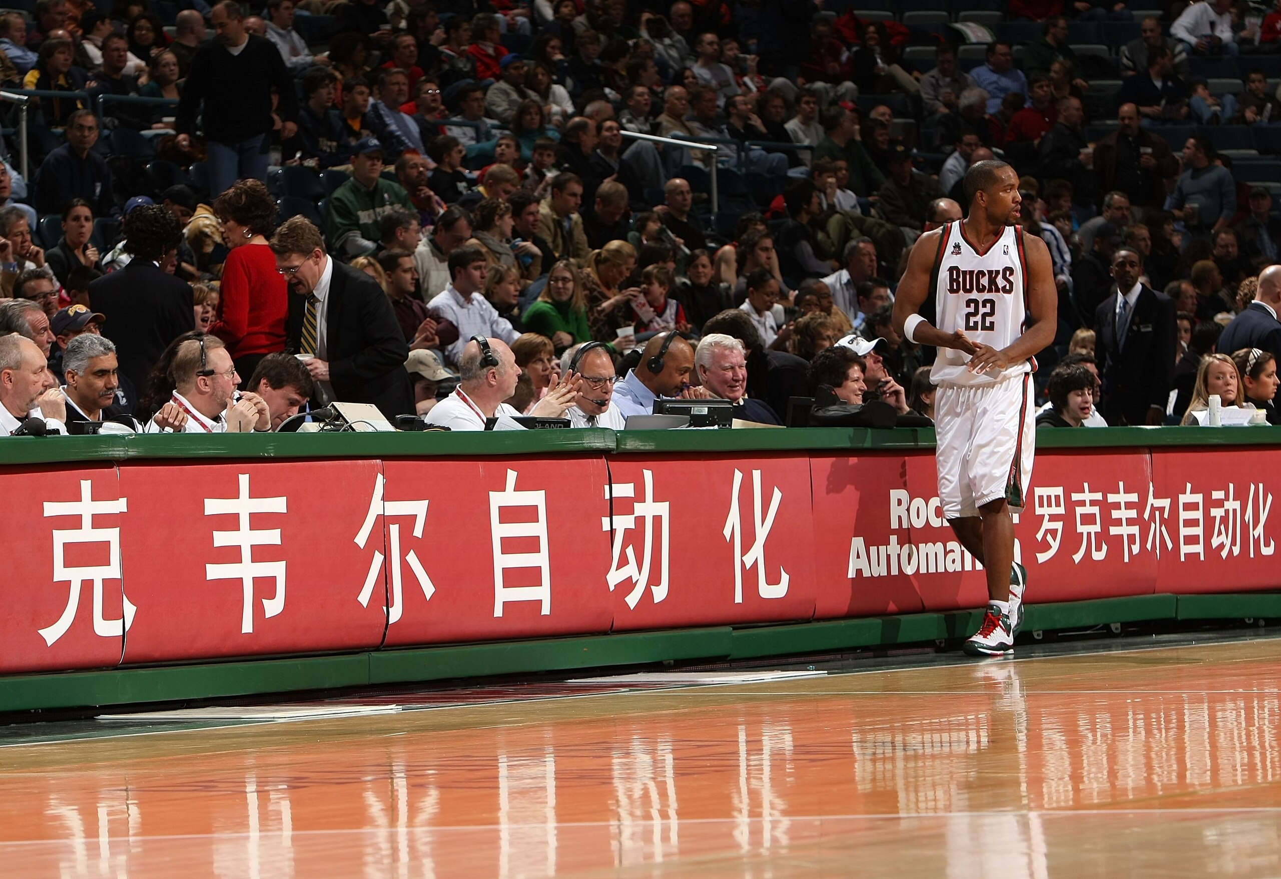 MILWAUKEE - JANUARY 22:  Michael Redd of the Milwaukee Bucks walks in front of the scores' table as he gets set to check back into the game against the Phoenix Suns at the Bradley Center on January 22, 2008 in Milwaukee, Wisconsin.  NOTE TO USER: User exp