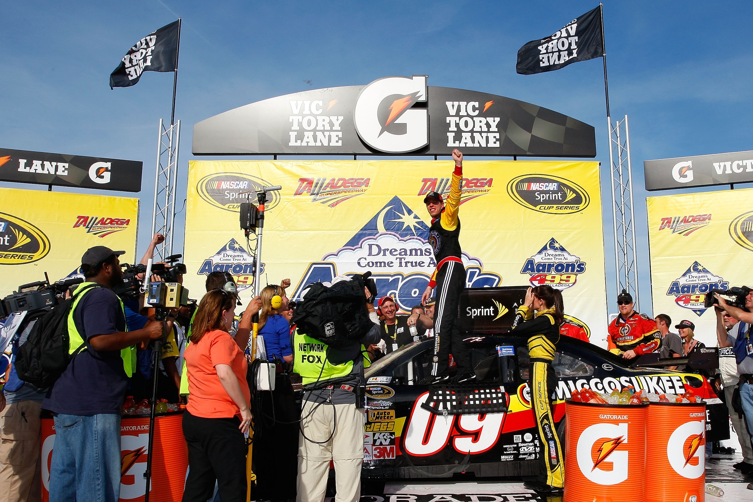 TALLADEGA, AL - APRIL 26:  Brad Keselowski, driver of the #09 Miccosukee Chevrolet, celebrates in victory lane after winning the NASCAR Sprint Cup Series Aaron's 499 at Talladega Superspeedway on April 26, 2009 in Talladega, Alabama.  (Photo by John Harre
