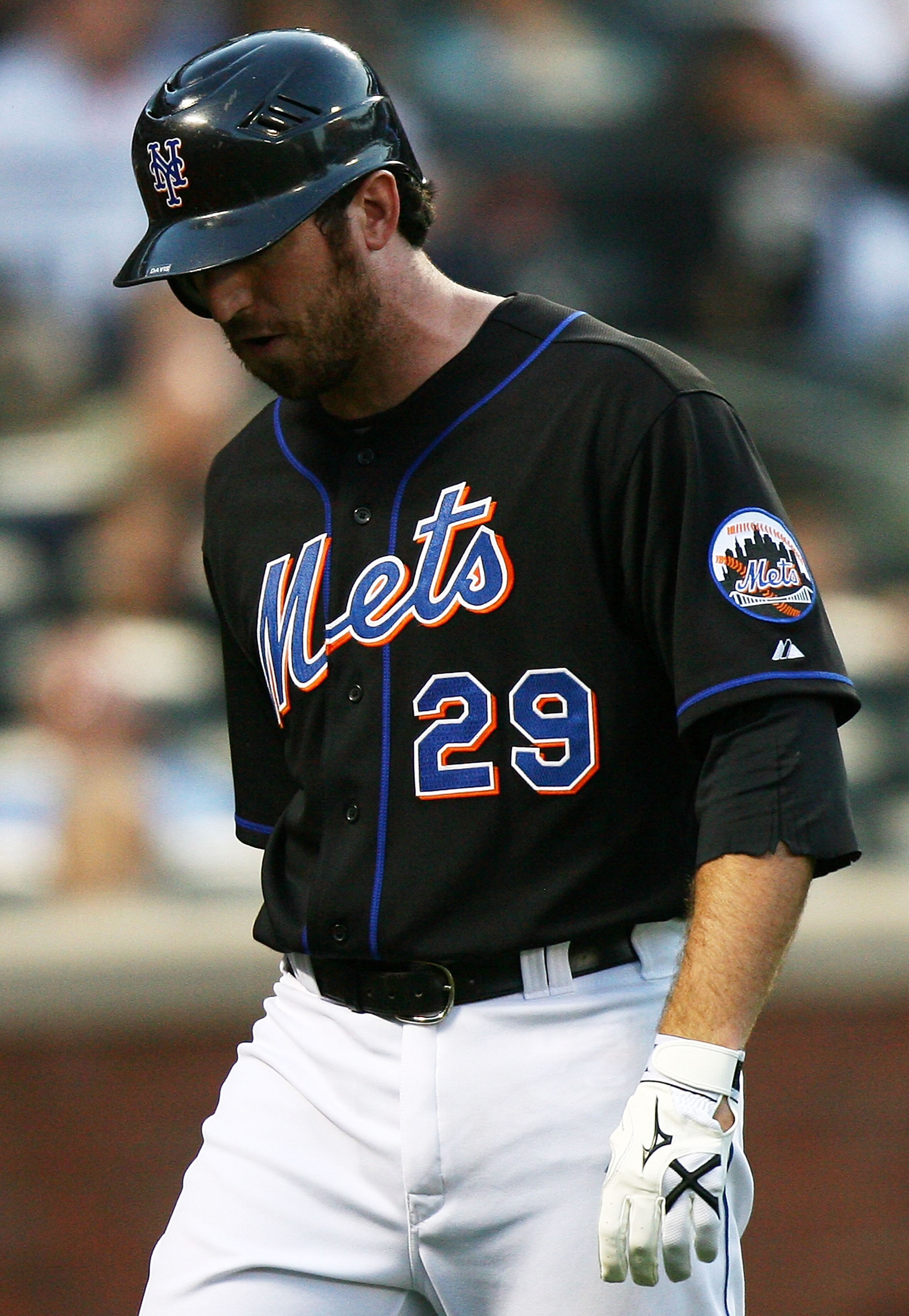 NEW YORK - SEPTEMBER 18: Ike Davis #29 of the New York Mets walks off after striking out in the ninth inning against the Atlanta Braves on September 18, 2010 at Citi Field in the Flushing neighborhood of the Queens borough of New York City. (Photo by An NEW YORK - SEPTEMBER 18: Ike Davis #29 of the New York Mets walks off after striking out in the ninth inning against the Atlanta Braves on September 18, 2010 at Citi Field in the Flushing neighborhood of the Queens borough of New York City. (Photo by An