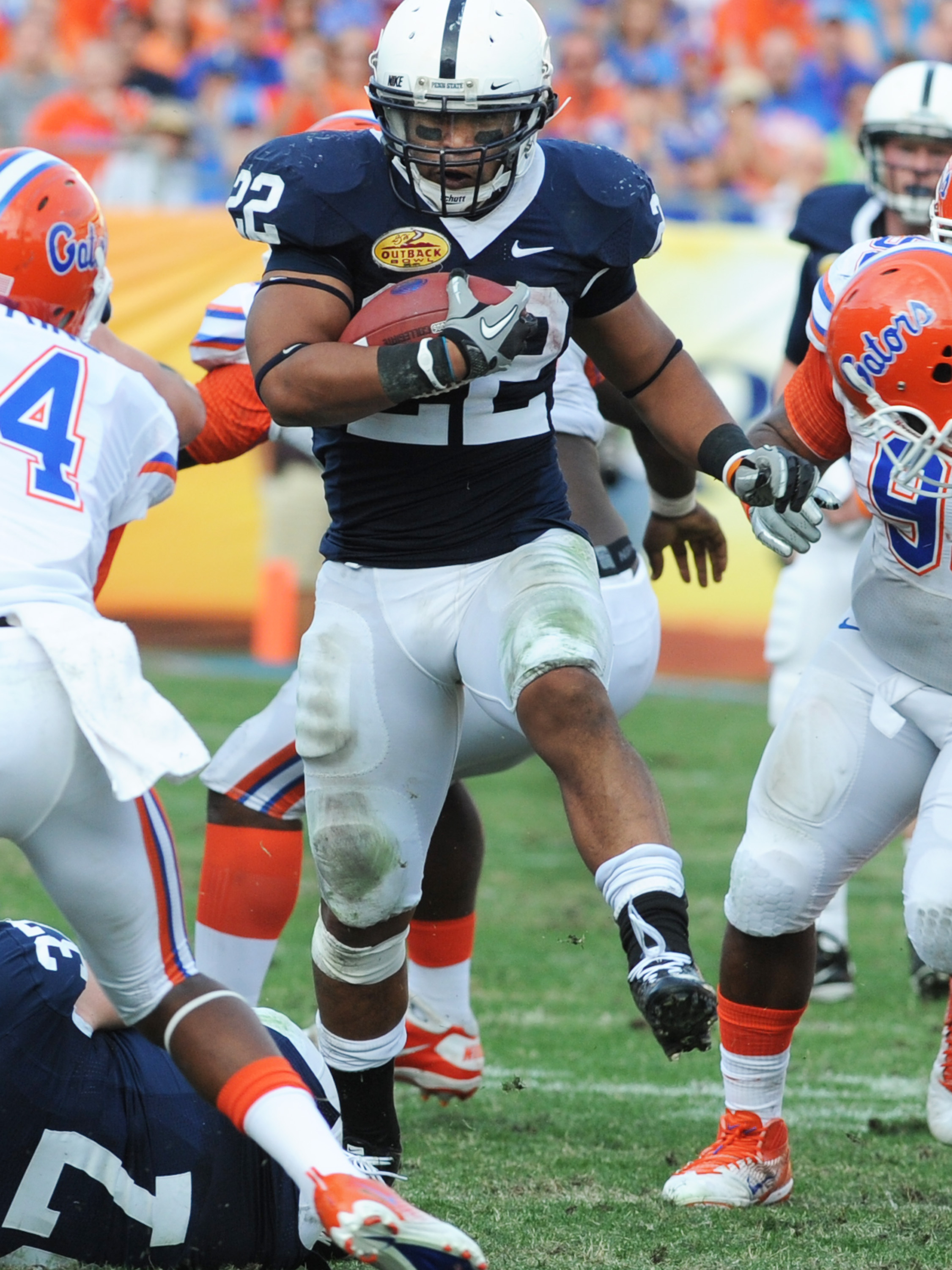 TAMPA, FL - JANUARY 1:  Running back Evan Royster #22 of the Penn State Nittany Lions rushes upfield against the Florida Gators January 1, 2010 in the 25th Outback Bowl at Raymond James Stadium in Tampa, Florida.  (Photo by Al Messerschmidt/Getty Images)