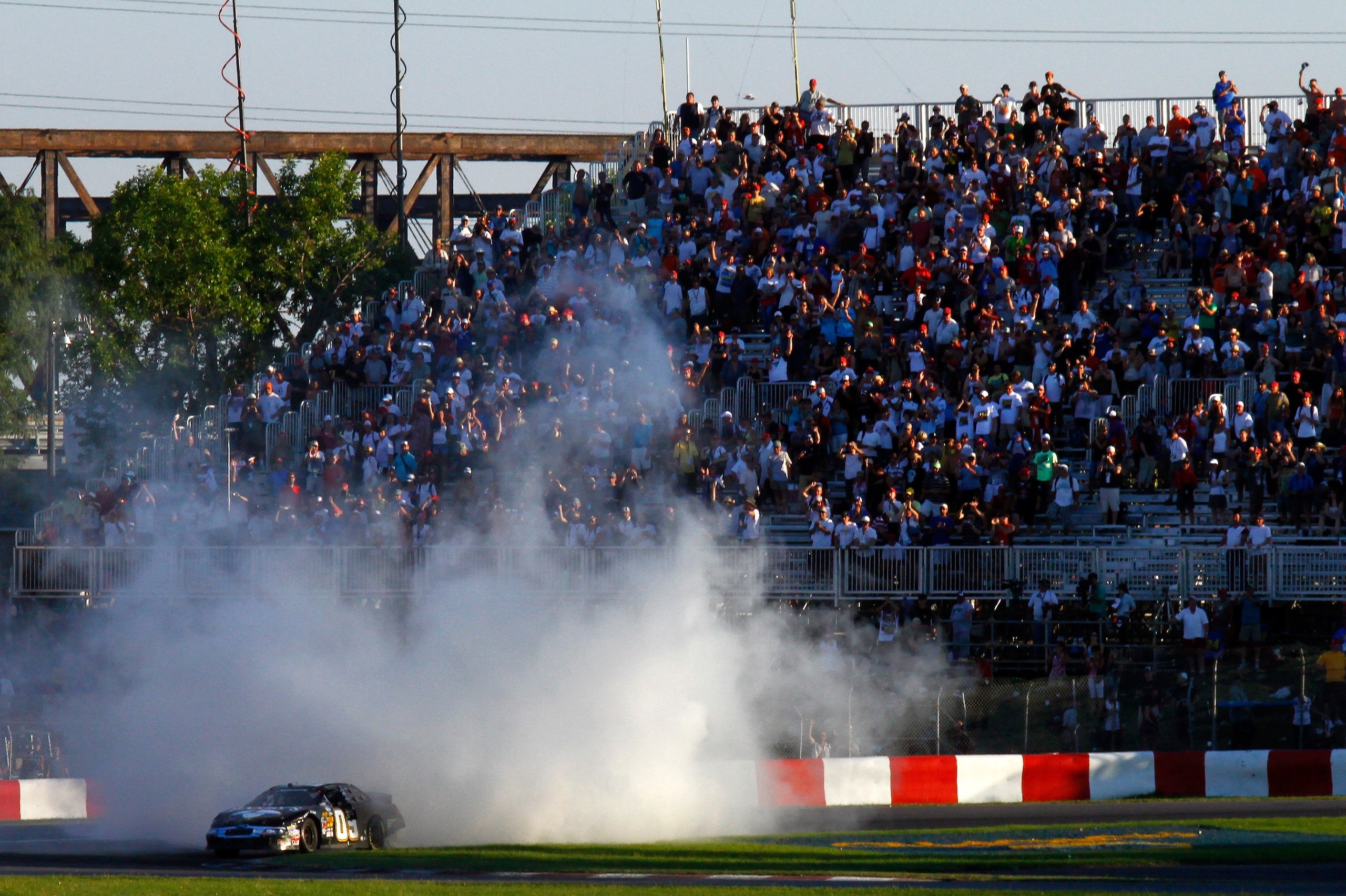 MONTREAL, QC - AUGUST 29:  Boris Said, driver of the #09 Zaxby's Ford celebrates by performing a burn out after winning the NASCAR Nationwide Series Napa Auto Parts 200 on August 29, 2010 at the Circuit Gilles Villeneuve in Montreal, Quebec, Canada.  (Pho