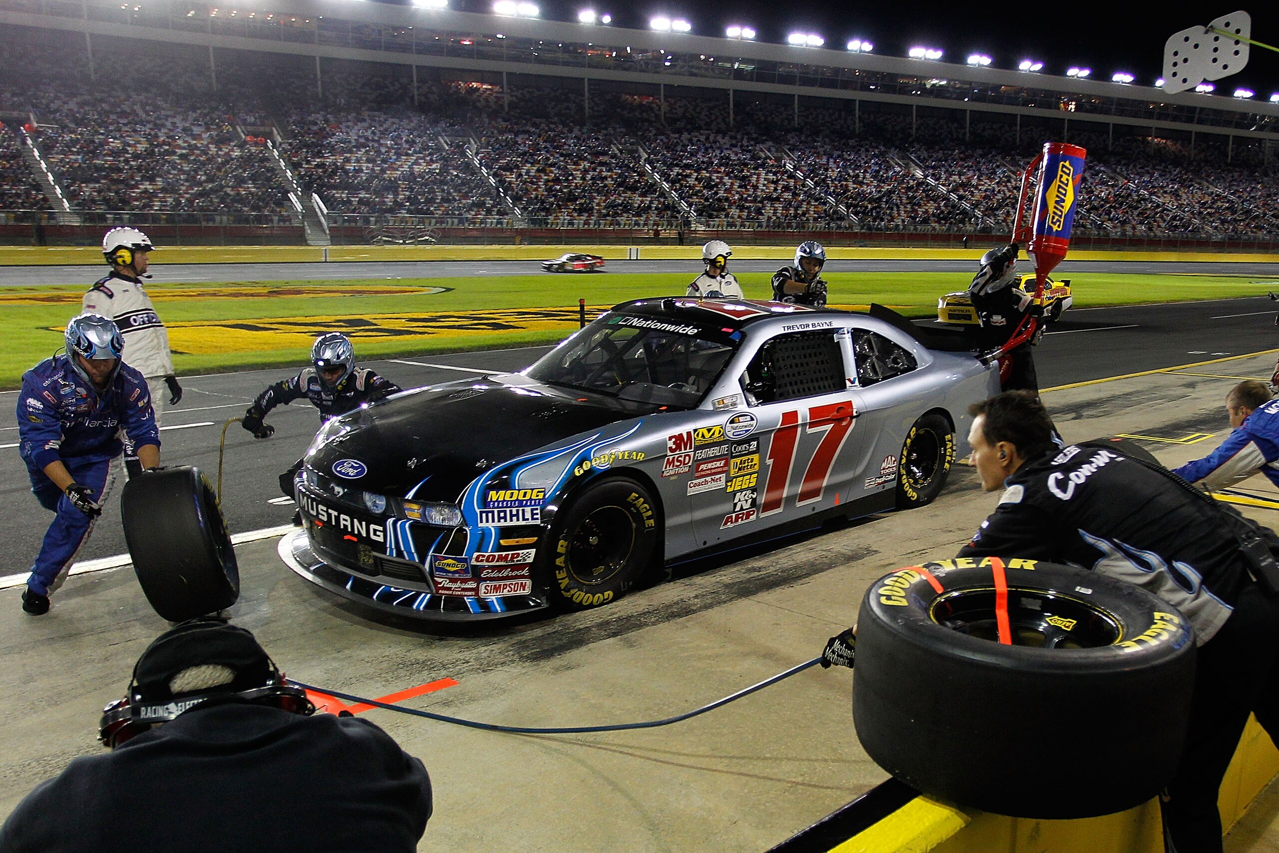CONCORD, NC - OCTOBER 15: Trevor Bayne, driver of the #17 Roush Fenway Ford, pits during the NASCAR Nationwide Series Dollar General 300 at Charlotte Motor Speedway on October 15, 2010 in Concord, North Carolina.  (Photo by Geoff Burke/Getty Images)