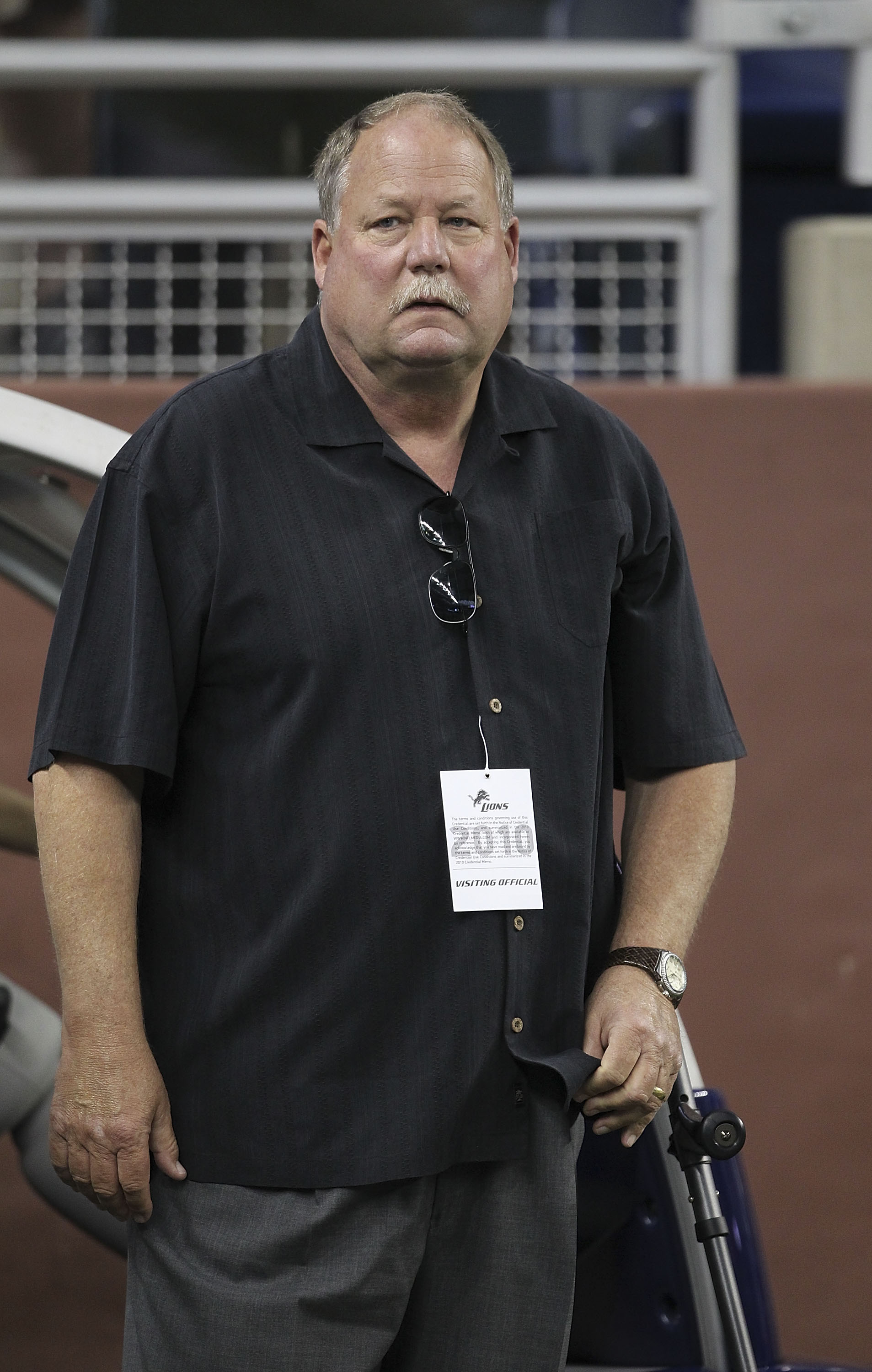DETROIT - AUGUST 28: Mike Holmgren President of the Cleveland Browns watches the action prior to the start of the preseason game against the Detroit Lions at Ford Field on August 28, 2010 in Detroit, Michigan. (Photo by Leon Halip/Getty Images)