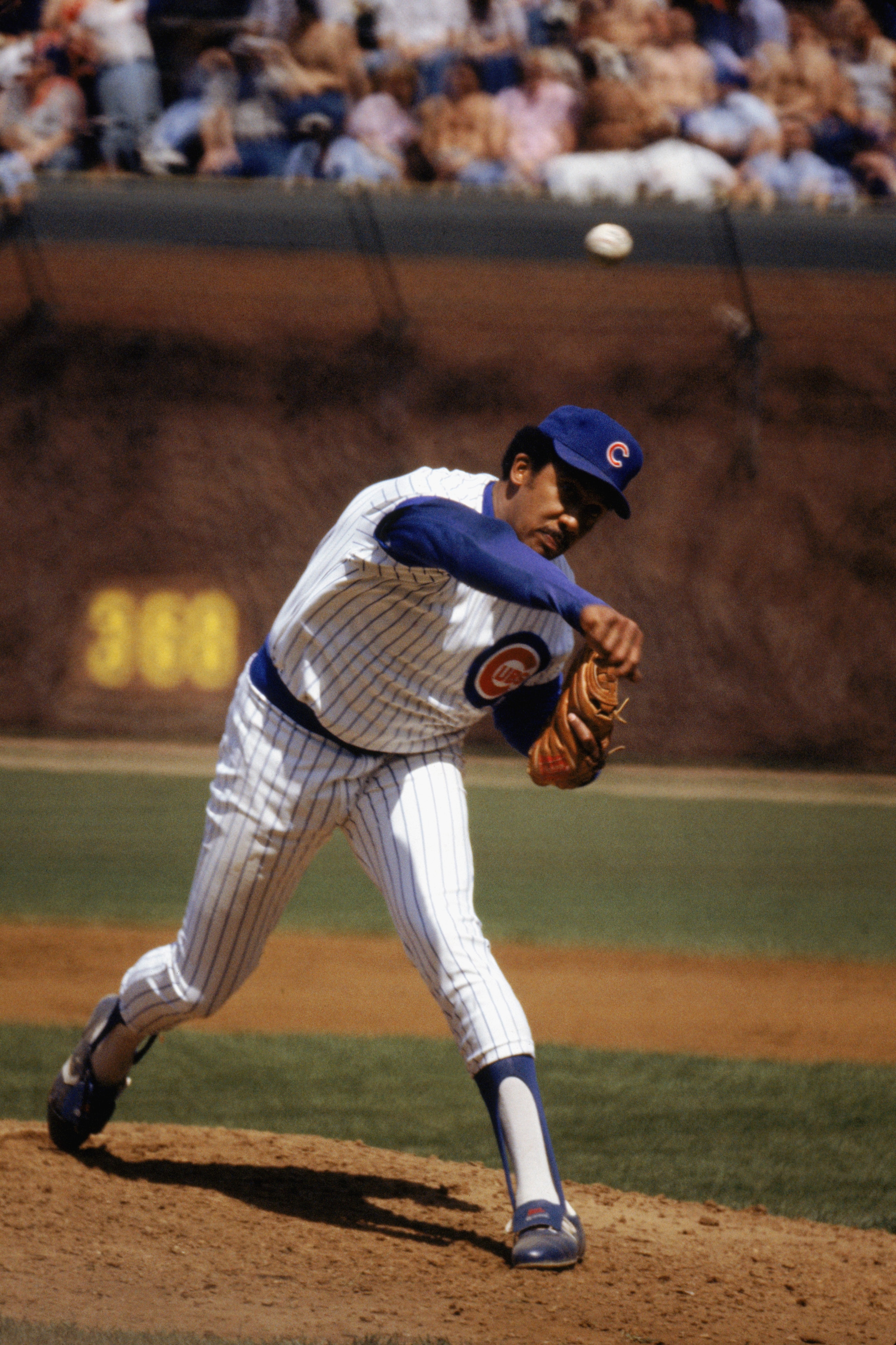 CHICAGO - 1983:  Fergie Jenkins # 31 of the Chicago Cubs pitches in a game during the 1983 season at Wrigley Field in Chicago, Illinois.  (Photo by: Jonathan Daniel/Getty Images)
