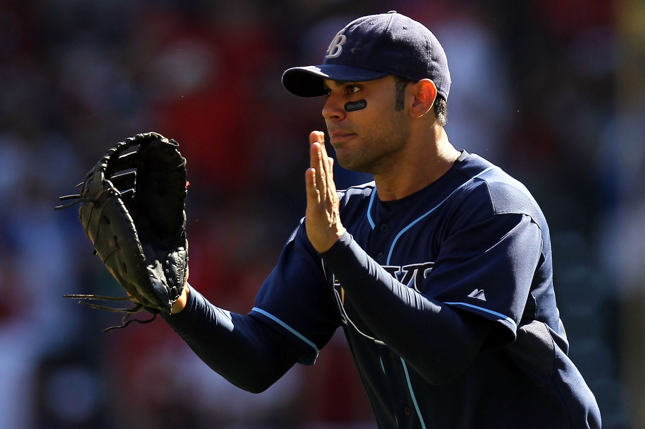 ARLINGTON, TX - OCTOBER 10:  Carlos Pena #23 of the Tampa Bay Rays celebrates after a 5-2 win against the Texas Rangers during game 4 of the ALDS at Rangers Ballpark in Arlington on October 10, 2010 in Arlington, Texas.  (Photo by Ronald Martinez/Getty Im