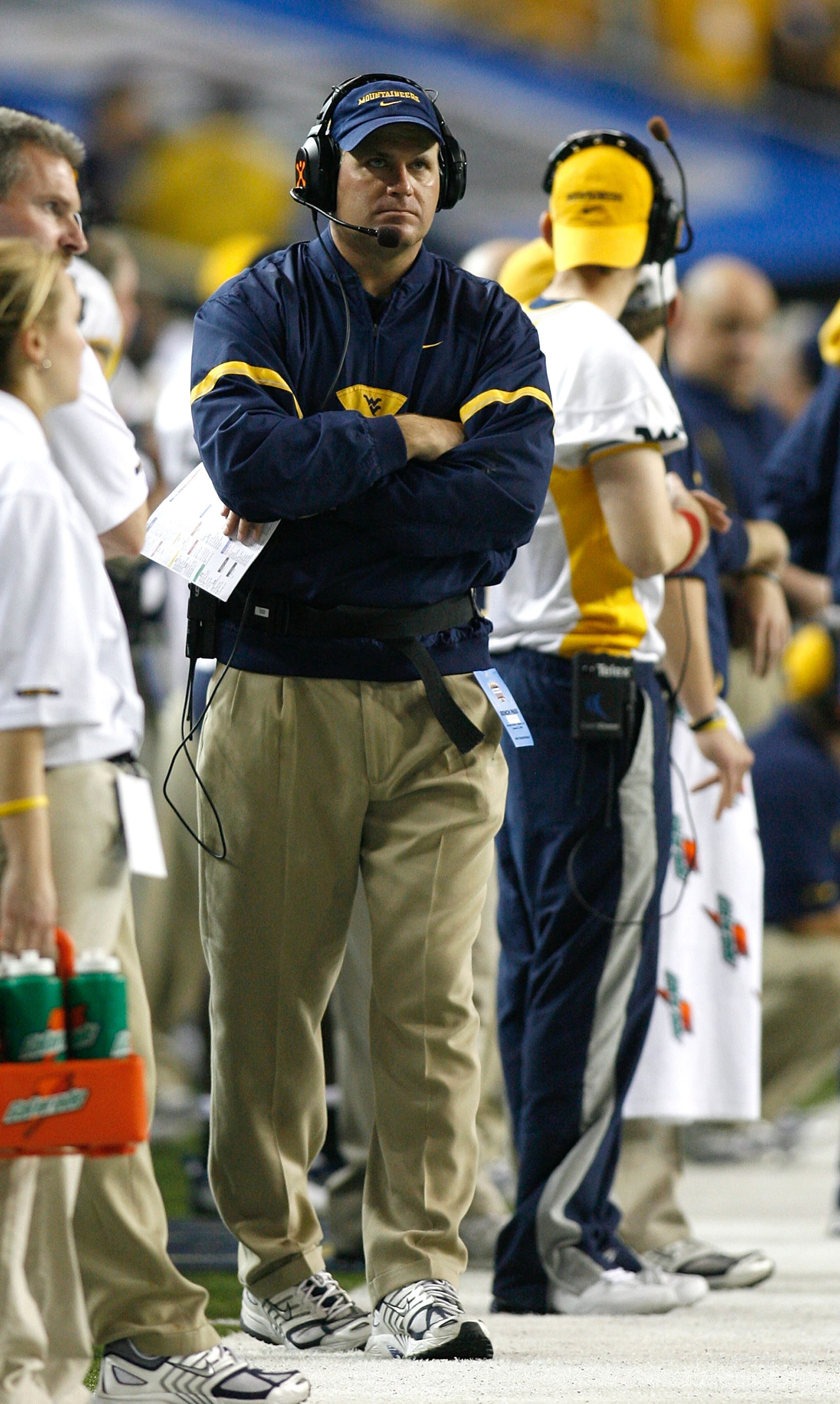 ATLANTA - JANUARY 02:  Head coach Rich Rodriguez of the West Virginia Mountaineers walks the sidelines during the Nokia Sugar Bowl against the Georgia Bulldogs at the Georgia Dome on January 2, 2006 in Atlanta, Georgia.  (Photo by Chris Graythen/Getty Ima