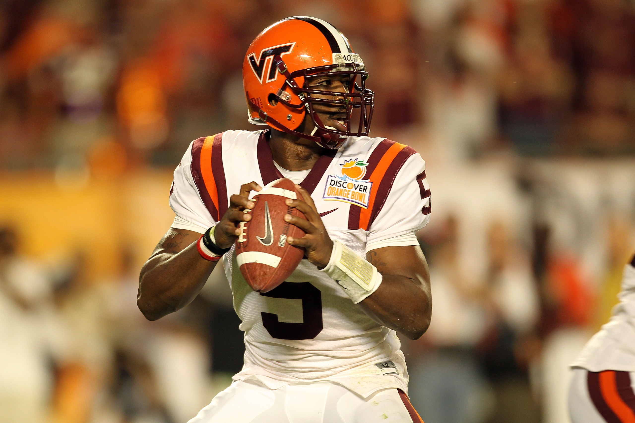 MIAMI, FL - JANUARY 03:  Tyrod Taylor #5 of the Virginai Tech Hokies drops back to pass against the Stanford Cardinal during the 2011 Discover Orange Bowl at Sun Life Stadium on January 3, 2011 in Miami, Florida.  (Photo by Mike Ehrmann/Getty Images)