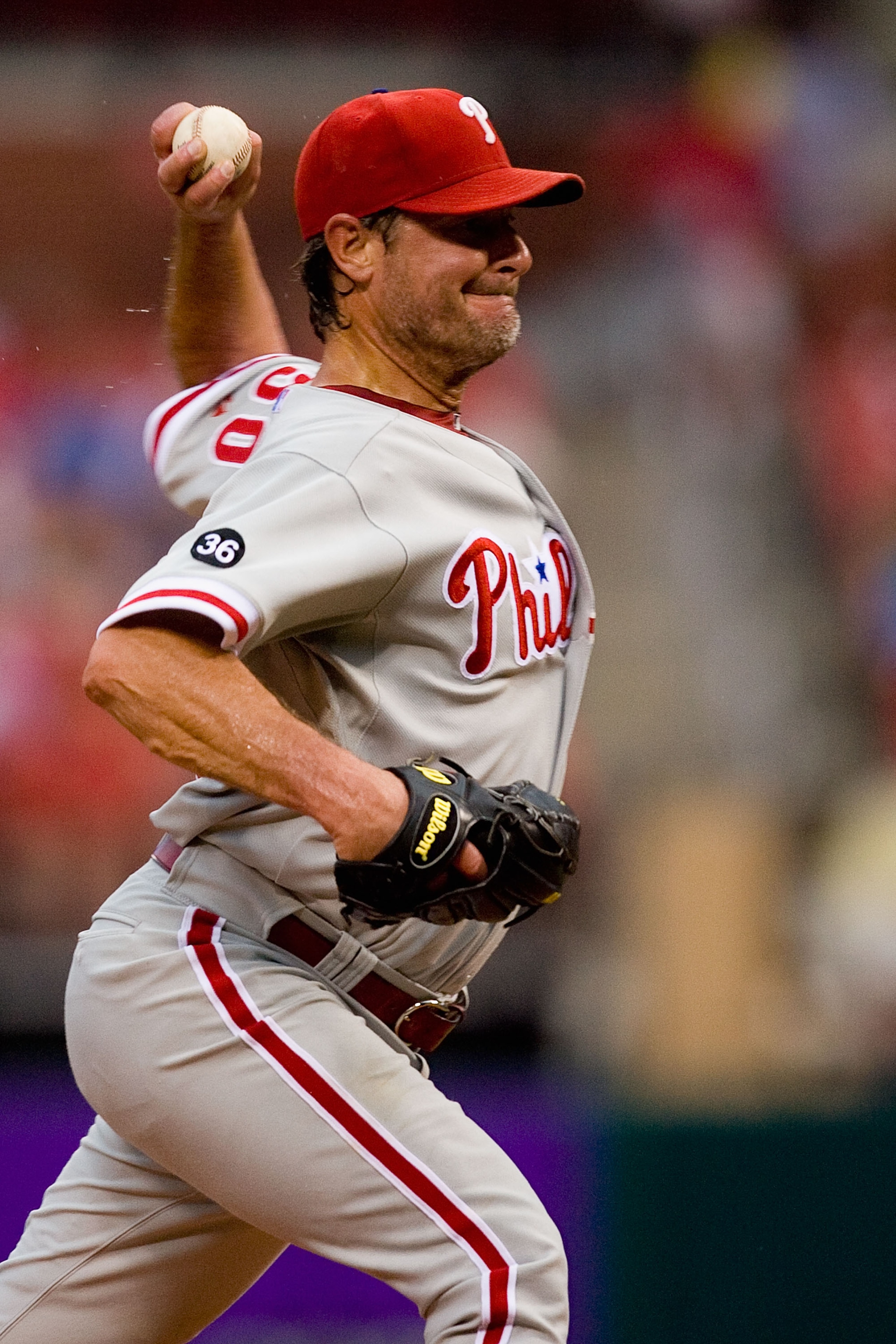ST. LOUIS - JULY 20: Starting pitcher Jamie Moyer #50 of the Philadelphia Phillies throws against the St. Louis Cardinals at Busch Stadium on July 20, 2010 in St. Louis, Missouri.  (Photo by Dilip Vishwanat/Getty Images)