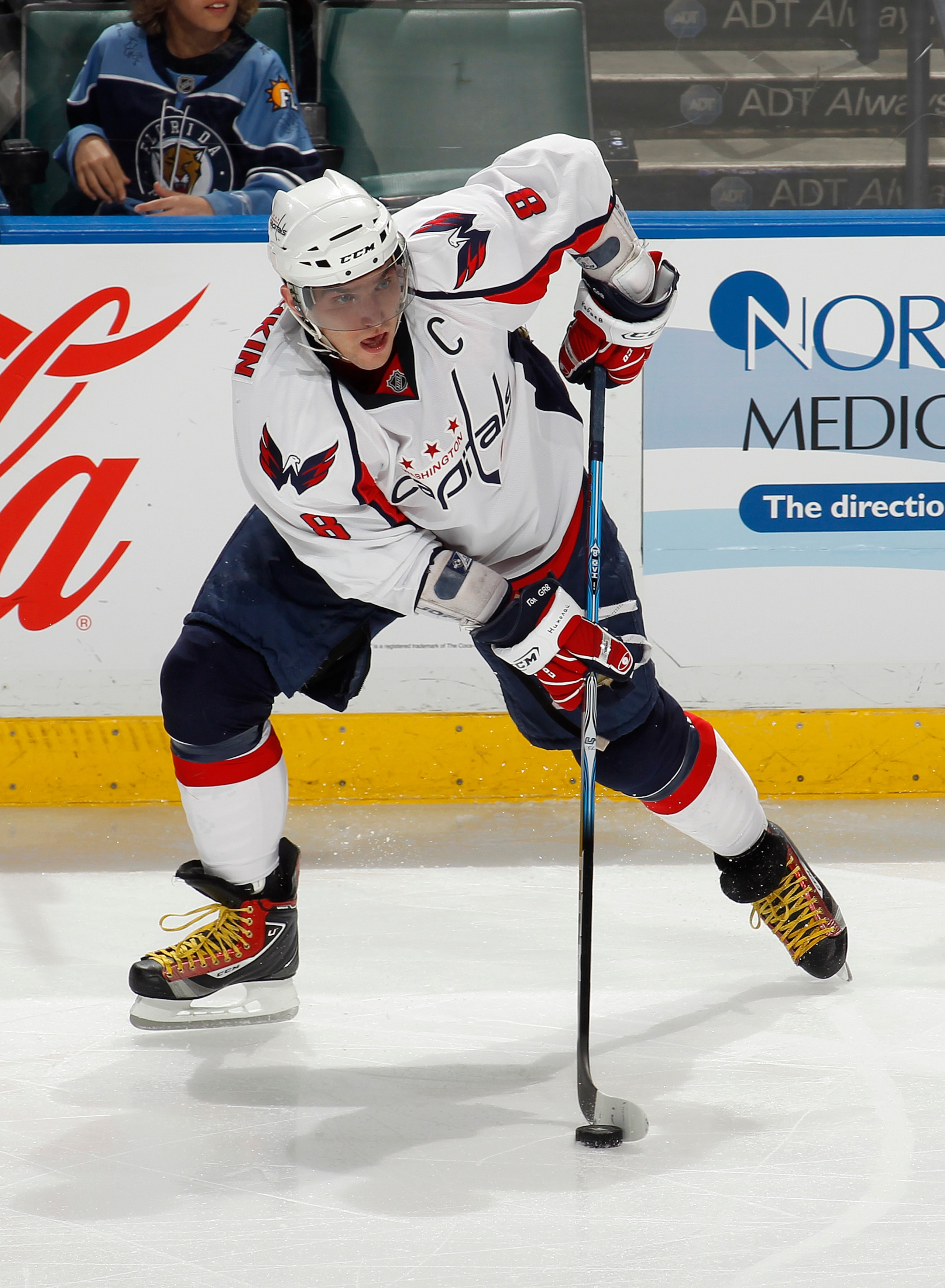 SUNRISE, FL - JANUARY 11: Alex Ovechkin #8 of the Washington Capitals skates with the puck during the overtime period against the Florida Panthers on January 11, 2011 at the BankAtlantic Center in Sunrise, Florida. The Panthers defeated the Capitals 4-3 i