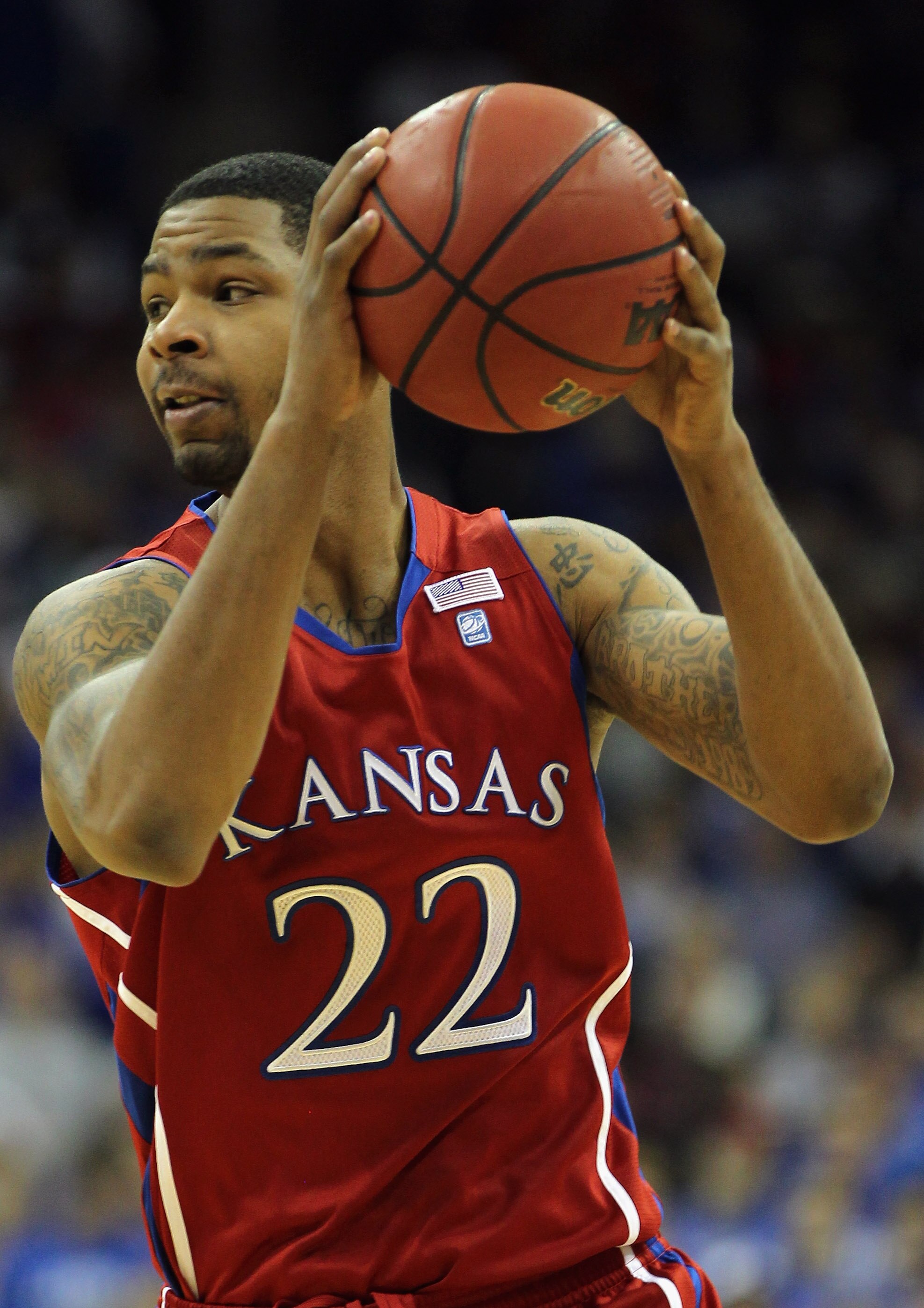 KANSAS CITY, MO - DECEMBER 11:  Marcus Morris #22 of the Kansas Jayhawks in action during the game against the Colorado State Rams on December 11, 2010 at the Sprint Center in Kansas City, Missouri.  (Photo by Jamie Squire/Getty Images)