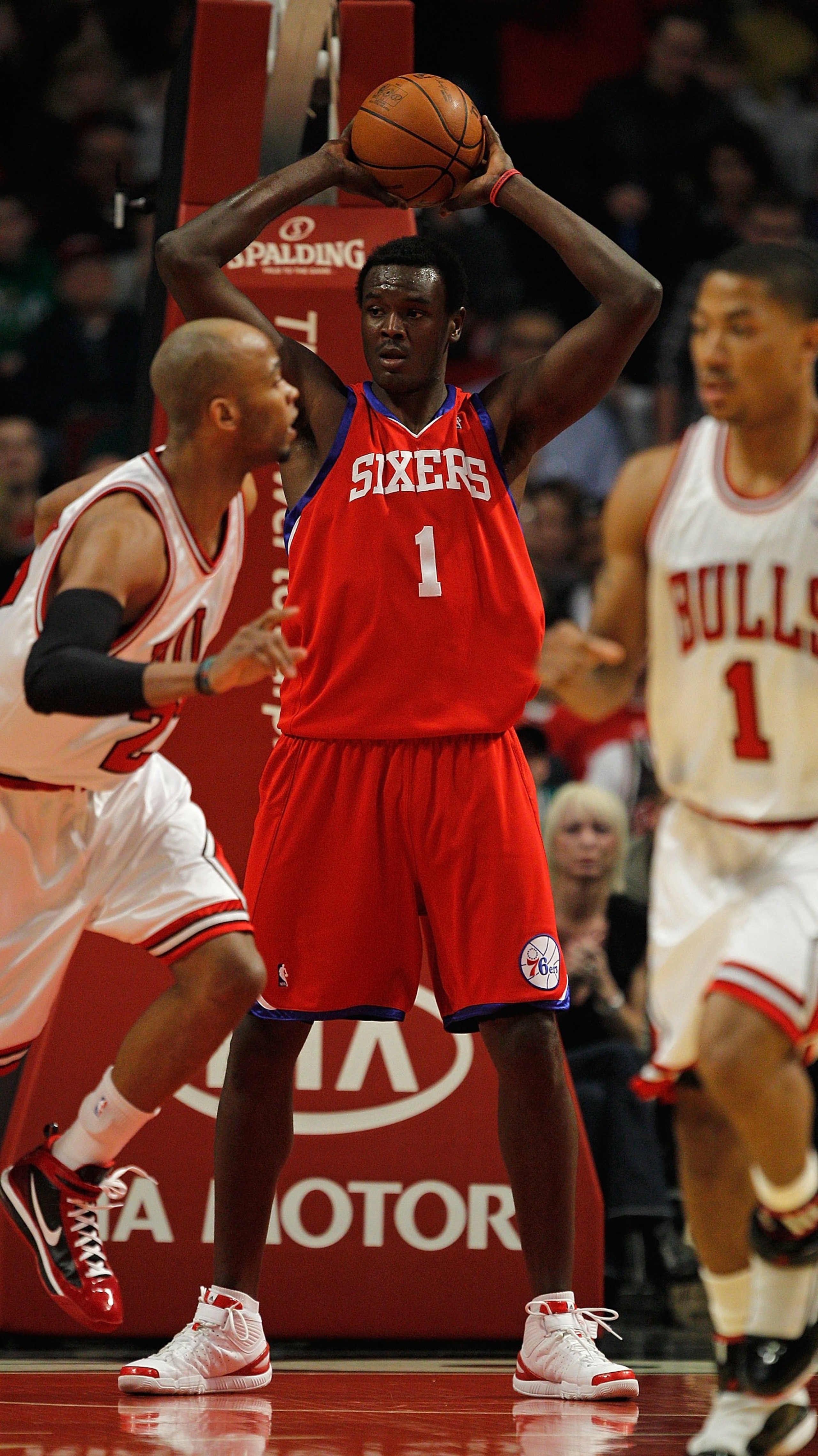 CHICAGO - FEBRUARY 20: Samuel Dalembert #1 of the Philadelphia 76ers looks to pass after grabbing a rebound against the Chicago Bulls at the United Center on February 20, 2010 in Chicago, Illinois. The Bulls defeated the 76ers 122-90. NOTE TO USER: User e CHICAGO - FEBRUARY 20: Samuel Dalembert #1 of the Philadelphia 76ers looks to pass after grabbing a rebound against the Chicago Bulls at the United Center on February 20, 2010 in Chicago, Illinois. The Bulls defeated the 76ers 122-90. NOTE TO USER: User e