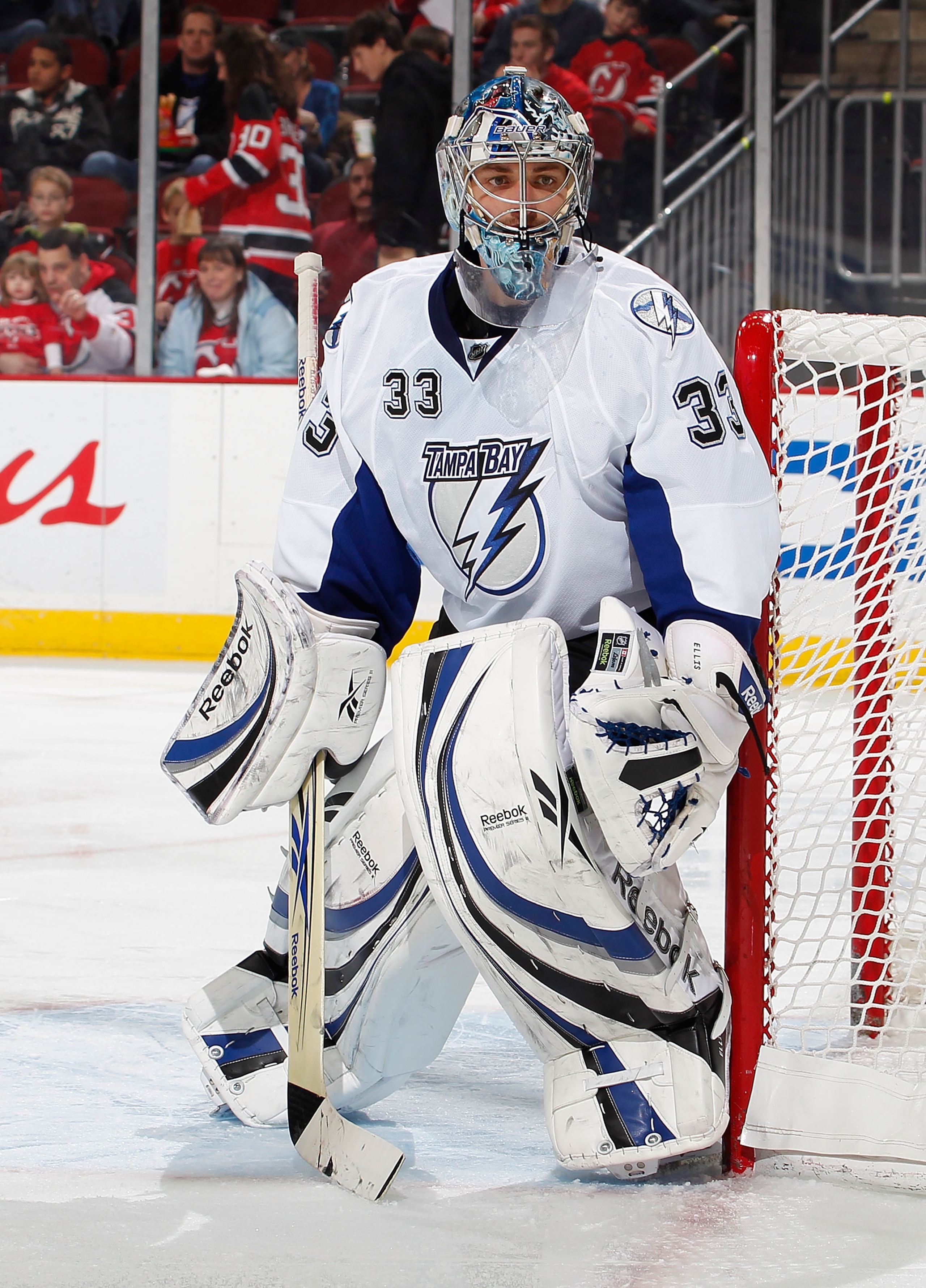 NEWARK, NJ - JANUARY 09:  Goalie Dan Ellis #33 of the Tampa Bay Lightning watches the play during an NHL hockey game against the New Jersey Devils at the Prudential Center on January 9, 2011 in Newark, New Jersey.  (Photo by Paul Bereswill/Getty Images)