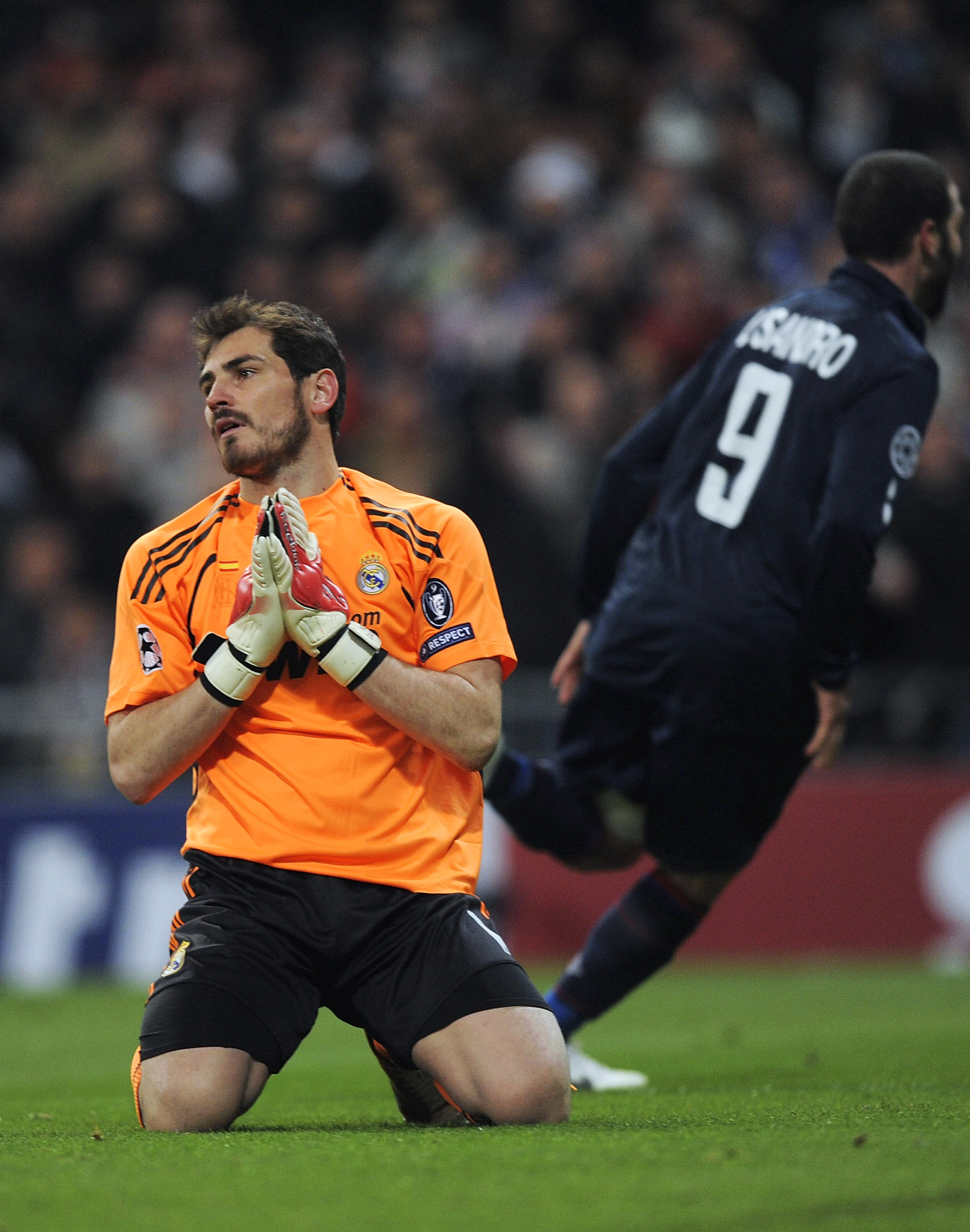 MADRID, SPAIN - MARCH 10: Iker Casillas of Real Madrid reacts after Olympique Lyonnais scored their first goal during the UEFA Champions League round of 16 2nd leg match between  Real Madrid and Olympique Lyonnais at Estadio Santiago Bernabeu on March 10,