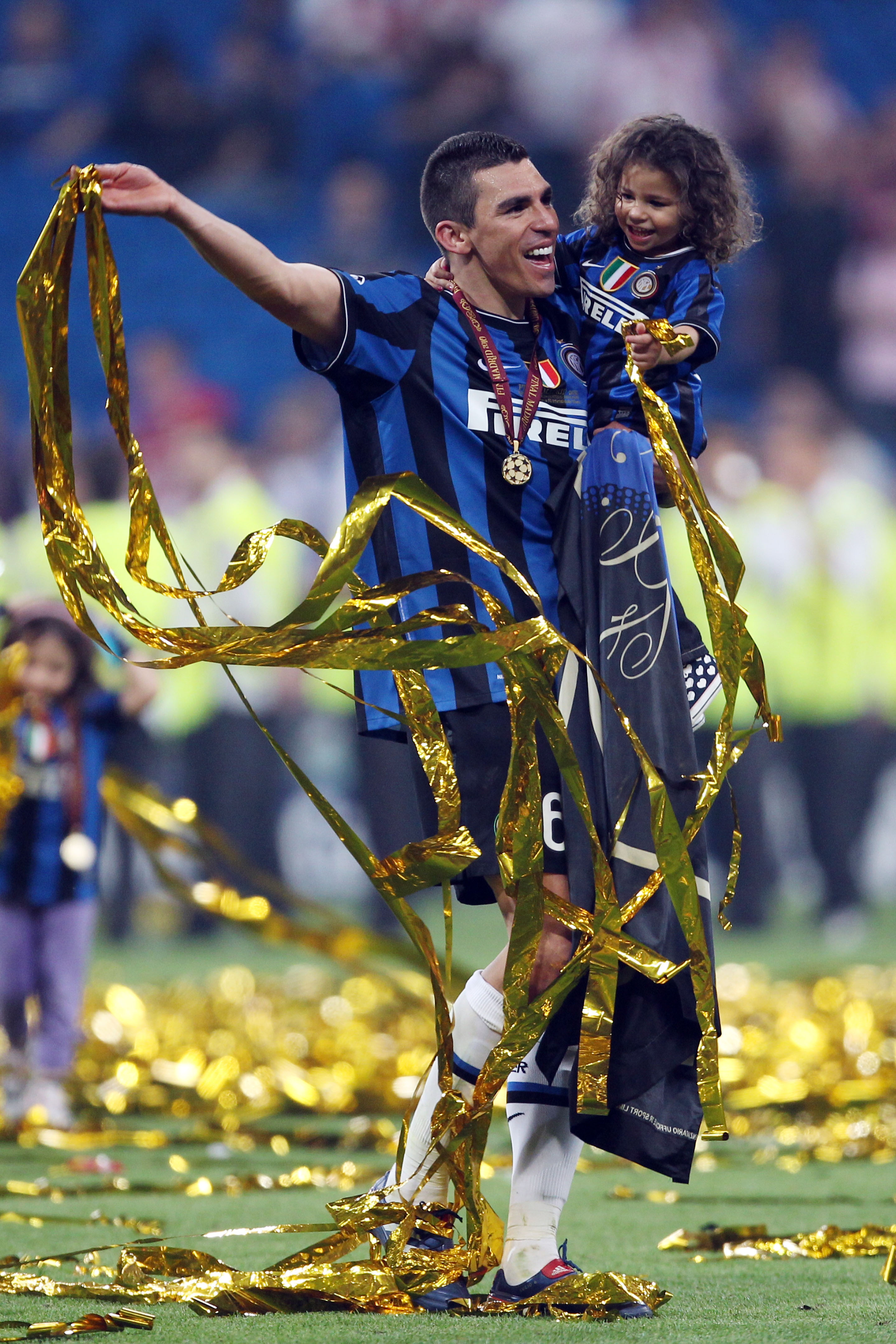 MADRID, SPAIN - MAY 22:  Lucio of Inter Milan and his family celebrate their team's victory at the end of the UEFA Champions League Final match between FC Bayern Muenchen and Inter Milan at the Estadio Santiago Bernabeu on May 22, 2010 in Madrid, Spain.