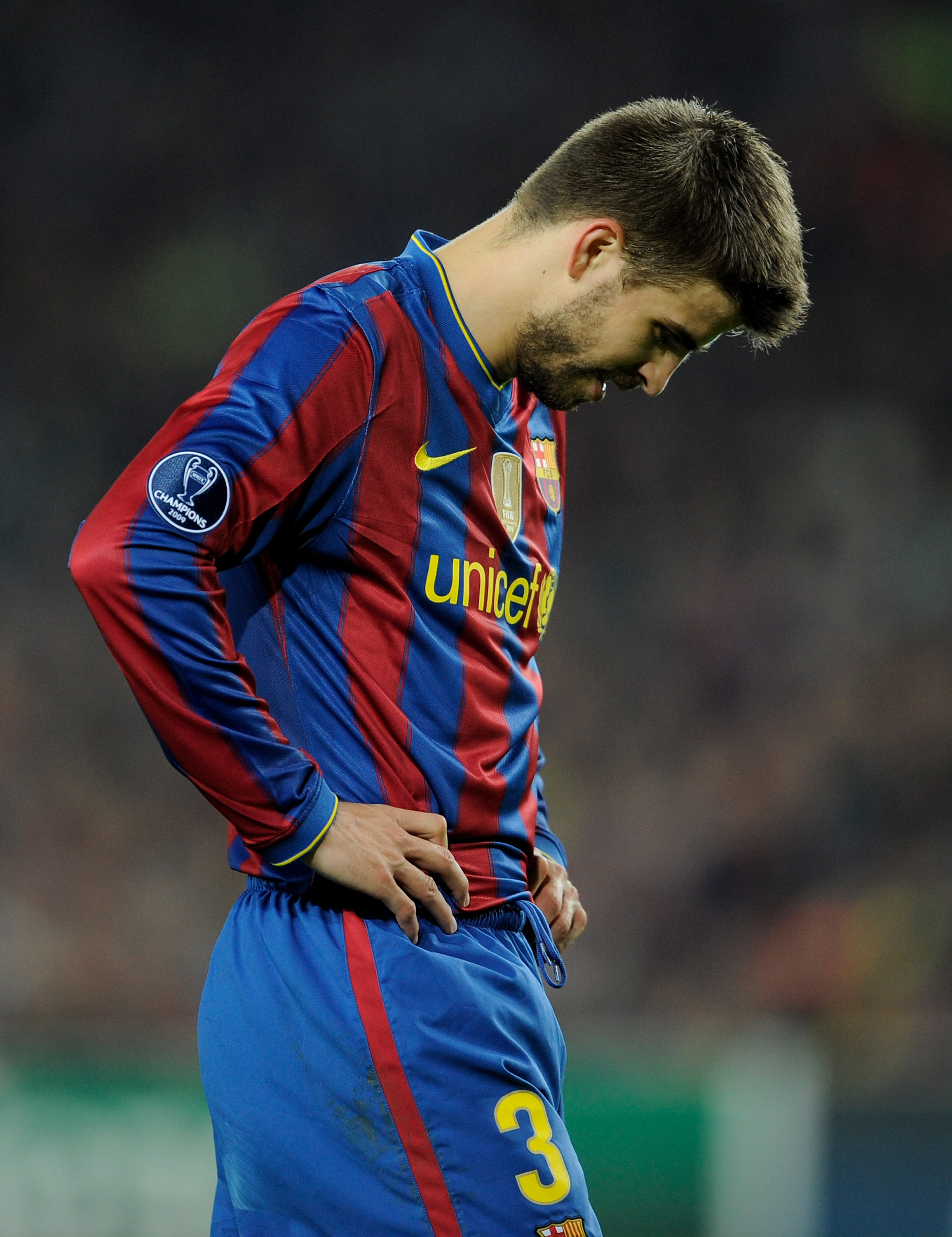 BARCELONA, SPAIN - APRIL 28:  Gerard Pique of Barcelona looks dejected during the UEFA Champions League Semi Final Second Leg match between Barcelona and Inter Milan at Camp Nou on April 28, 2010 in Barcelona, Spain.  (Photo by Michael Regan/Getty Images)