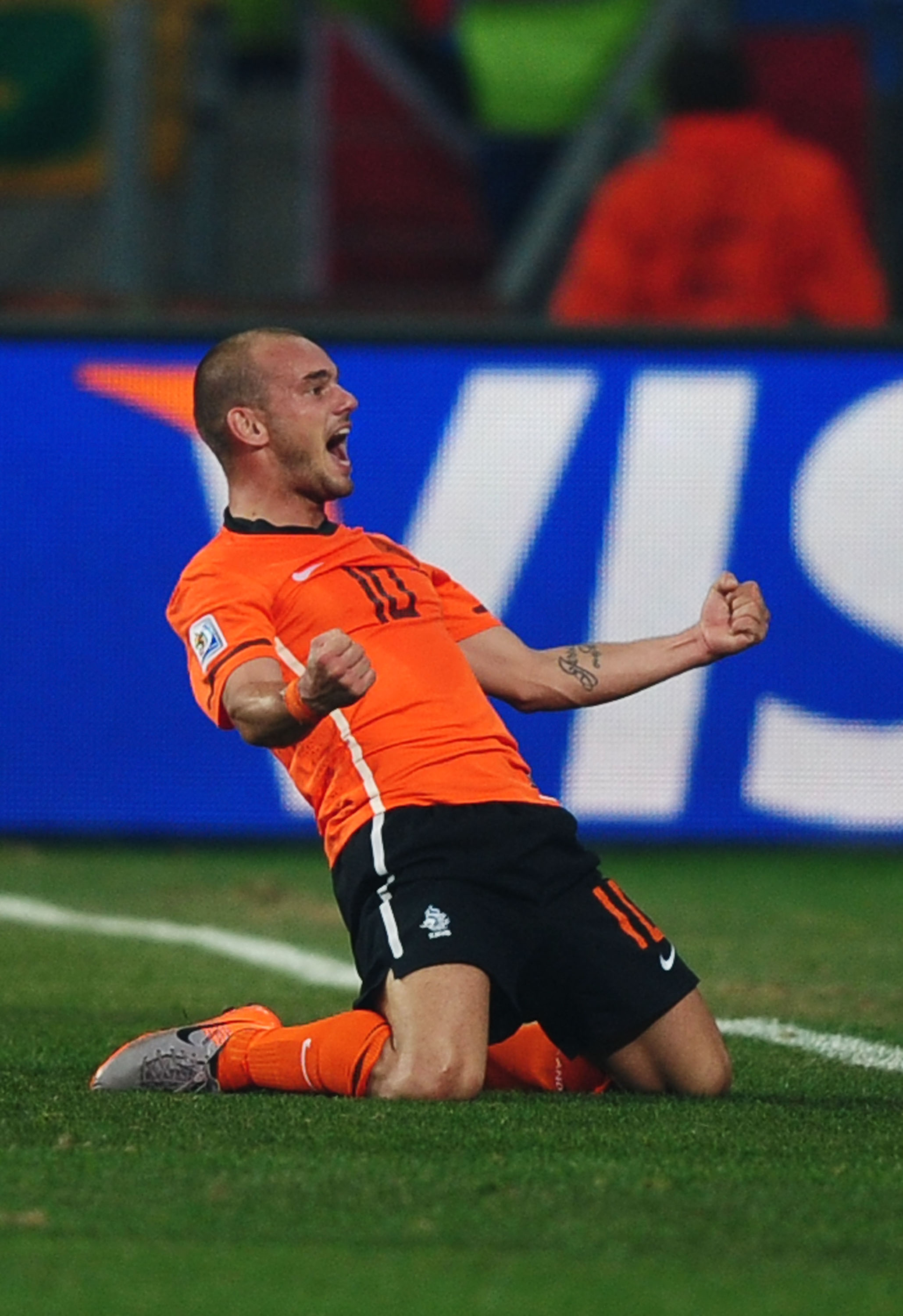 PORT ELIZABETH, SOUTH AFRICA - JULY 02:  Wesley Sneijder of the Netherlands celebrates scoring his team's second goal during the 2010 FIFA World Cup South Africa Quarter Final match between Netherlands and Brazil at Nelson Mandela Bay Stadium on July 2, 2