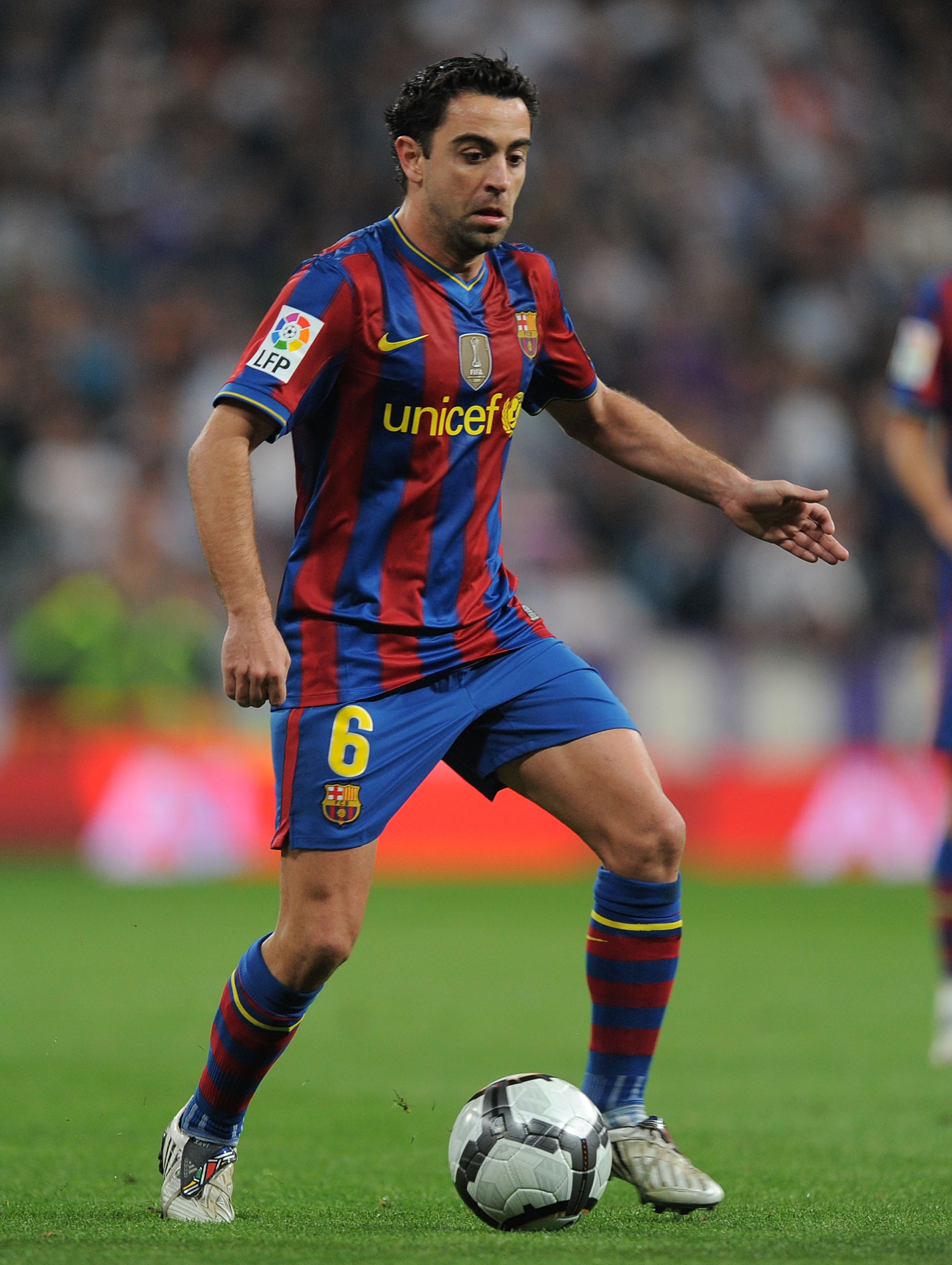MADRID, SPAIN - APRIL 10:  Xavi Hernandez of Barcelona in action during the La Liga match between Real Madrid and Barcelona at the Estadio Santiago Bernabeu on April 10, 2010 in Madrid, Spain.  (Photo by Denis Doyle/Getty Images)