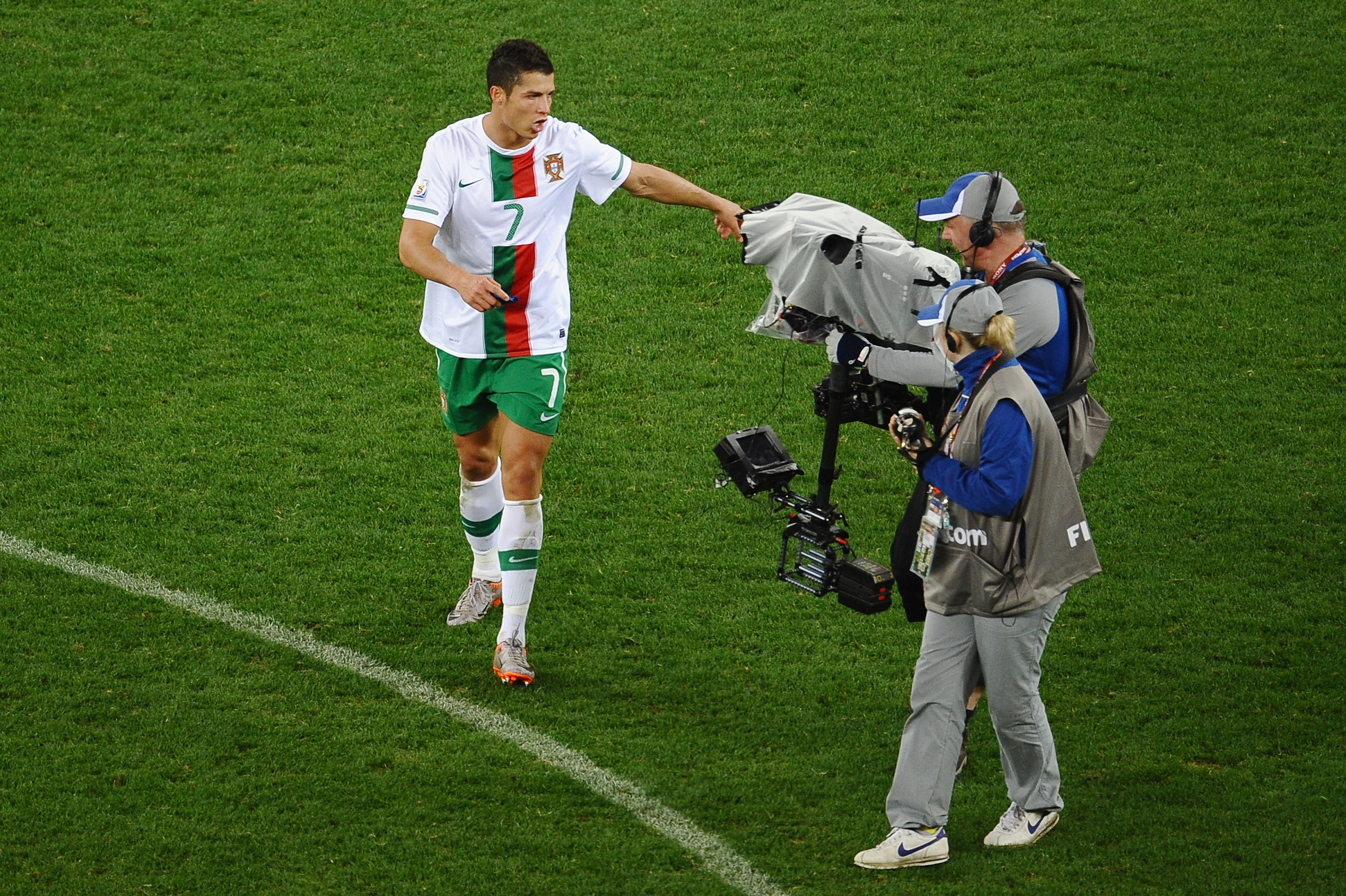 CAPE TOWN, SOUTH AFRICA - JUNE 29:  A dejected Cristiano Ronaldo of Portugal reacts to a TV camera after suffering defeat in the 2010 FIFA World Cup South Africa Round of Sixteen match between Spain and Portugal at Green Point Stadium on June 29, 2010 in