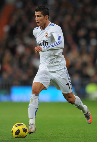 MADRID, SPAIN - DECEMBER 04:  Cristiano Ronaldo of Real Madrid controls the ball during the La Liga match between Real Madrid and Valencia at Estadio Santiago Bernabeu on December 4, 2010 in Madrid, Spain.  (Photo by Jasper Juinen/Getty Images)