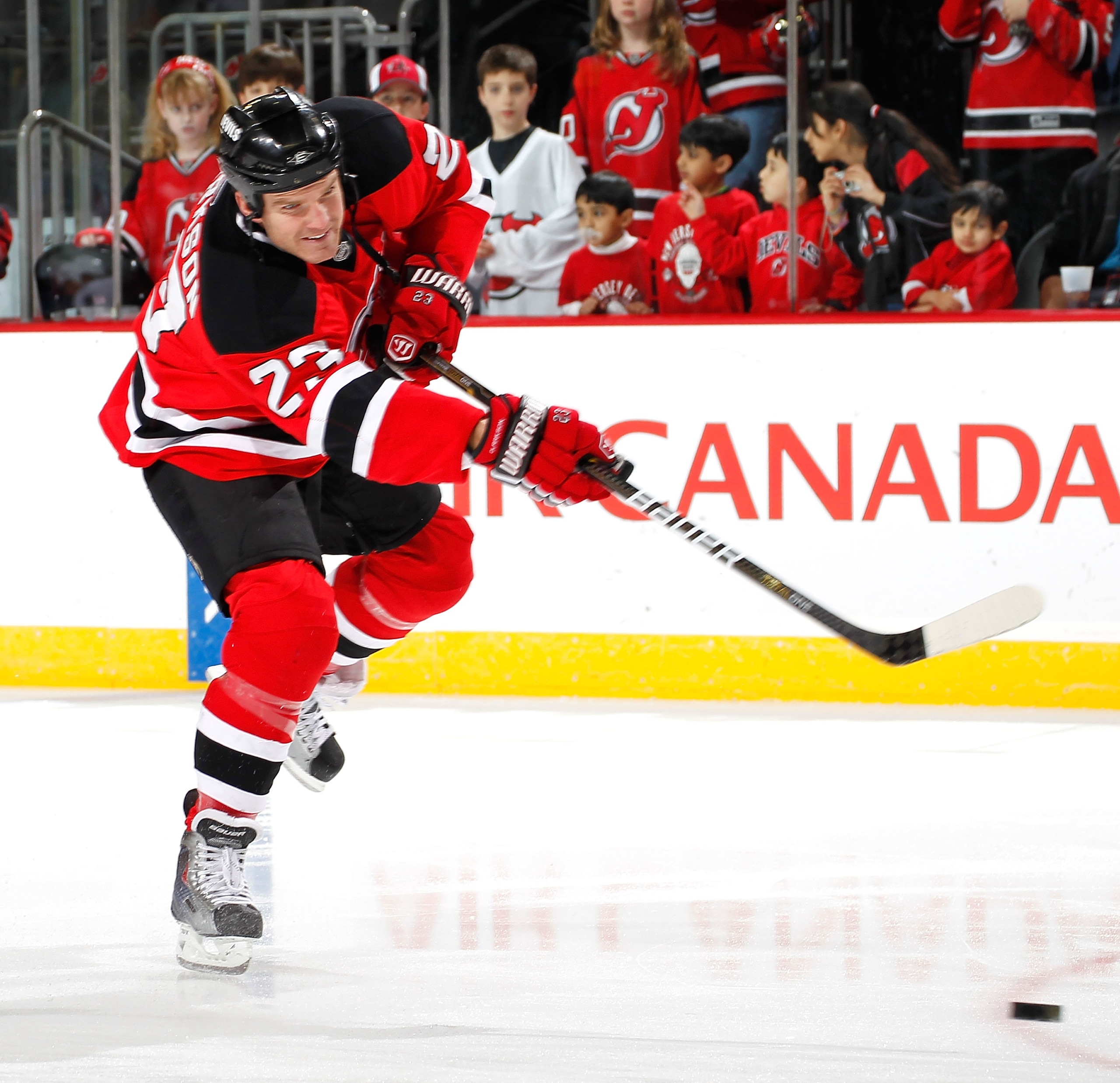 NEWARK, NJ - JANUARY 09:  David Clarkson #23 of the New Jersey Devils shoots during warmups before an NHL hockey game against the Tampa Bay Lightning at the Prudential Center on January 9, 2011 in Newark, New Jersey.  (Photo by Paul Bereswill/Getty Images