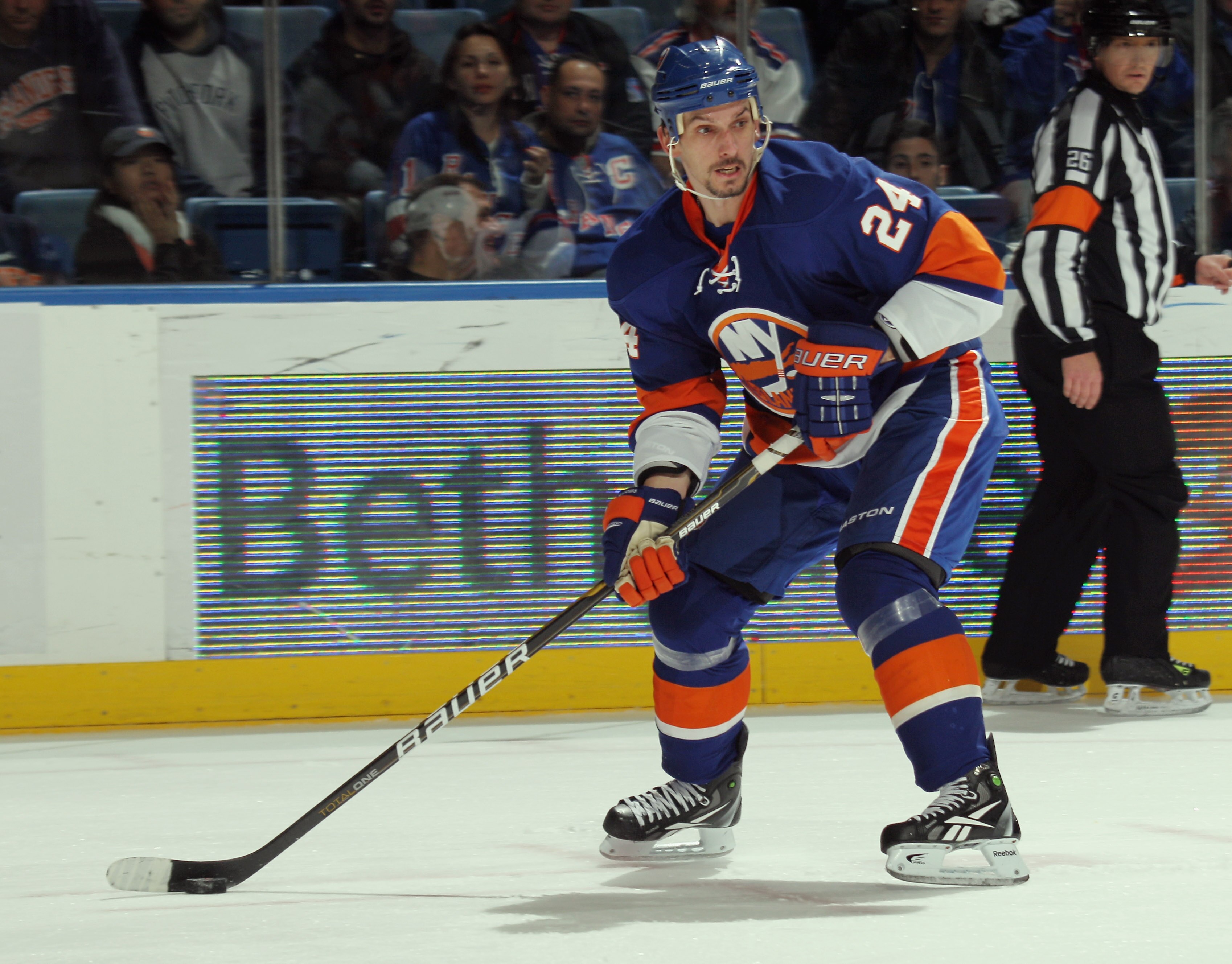 UNIONDALE, NY - DECEMBER 02:  Radek Martinek #24 of the New York Islanders skates against the New York Rangers at the Nassau Coliseum on December 2, 2010 in Uniondale, New York.  (Photo by Bruce Bennett/Getty Images)
