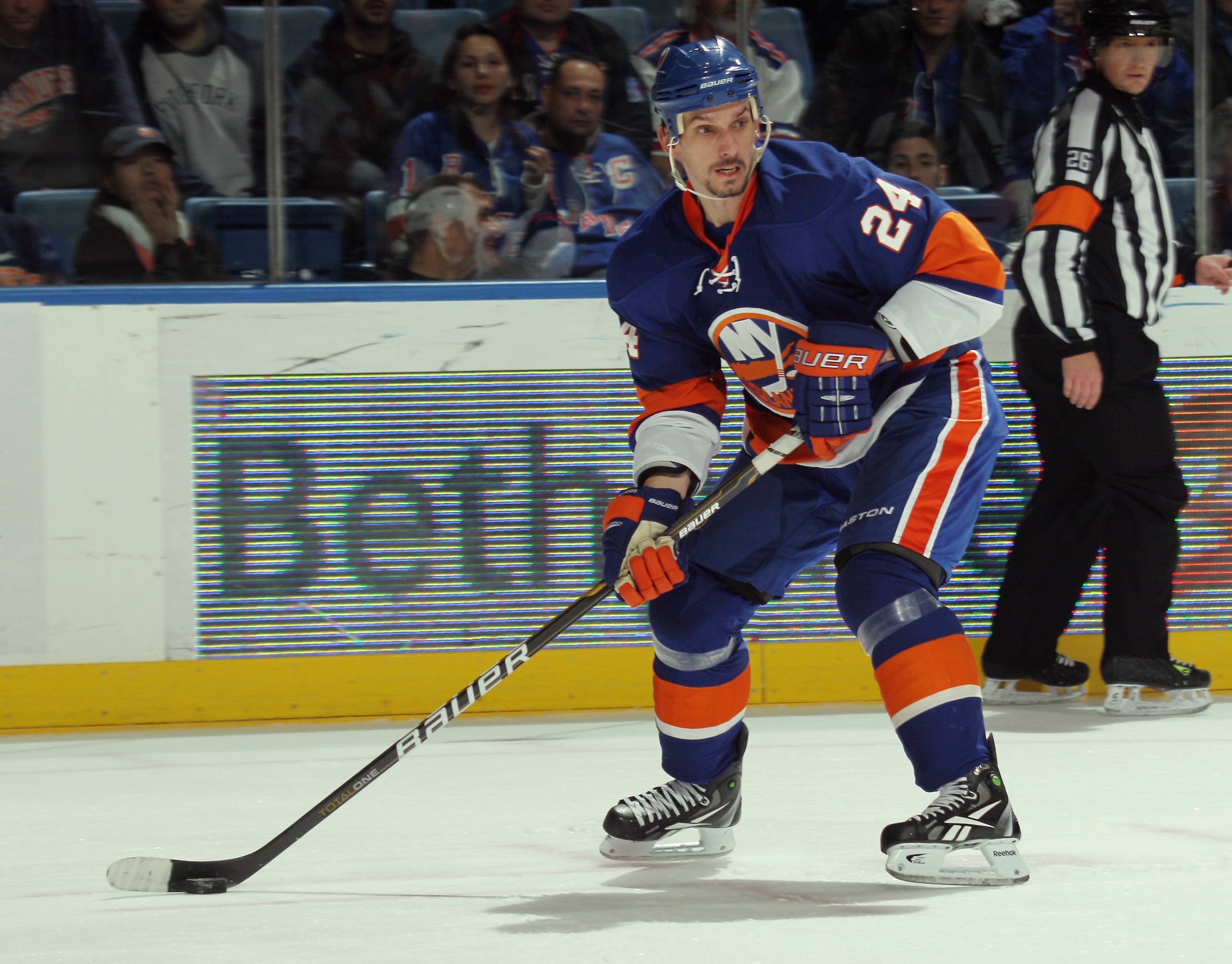 UNIONDALE, NY - DECEMBER 02:  Radek Martinek #24 of the New York Islanders skates against the New York Rangers at the Nassau Coliseum on December 2, 2010 in Uniondale, New York.  (Photo by Bruce Bennett/Getty Images)