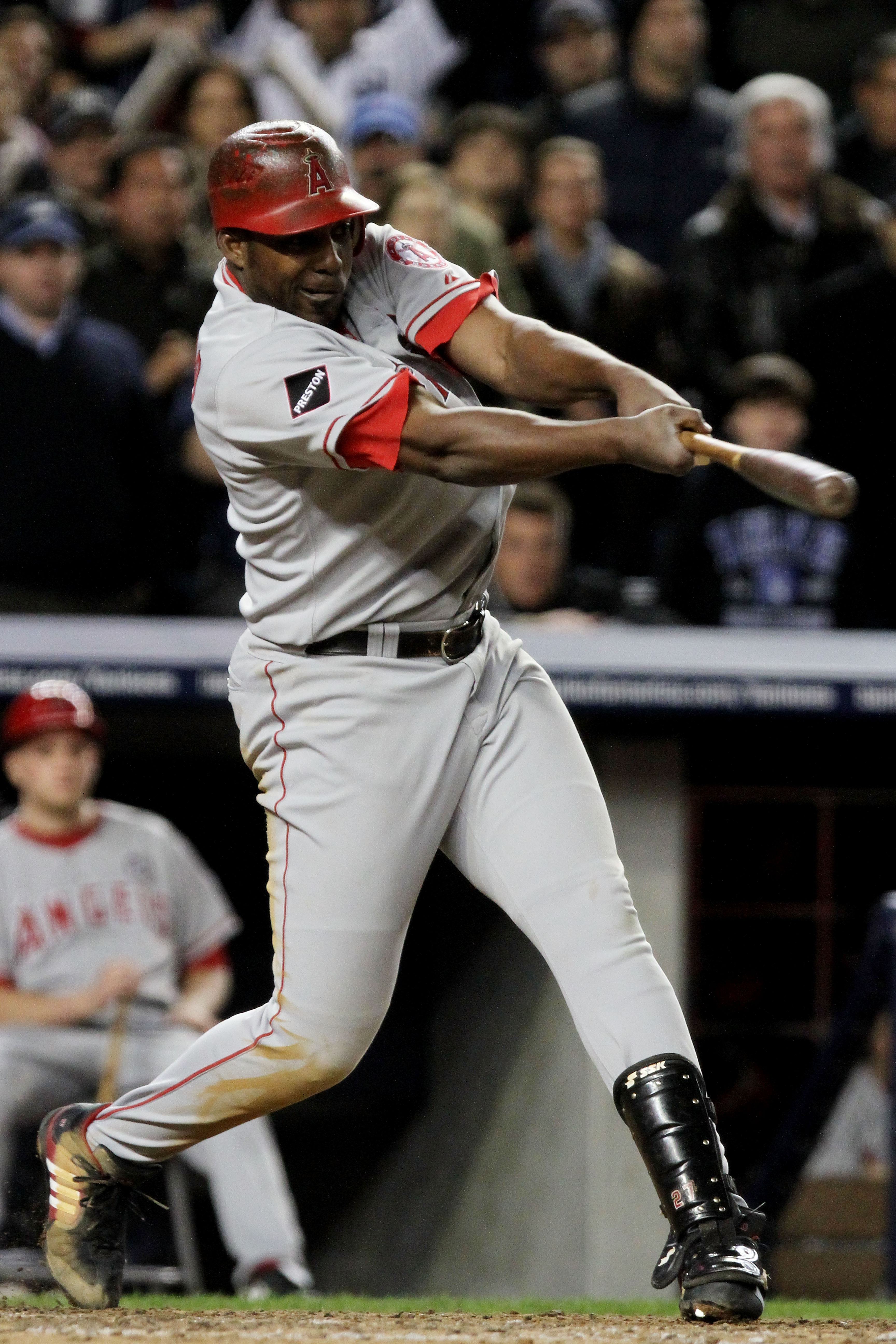 NEW YORK - OCTOBER 25:  Vladimir Guerrero #27 of the Los Angeles Angels of Anaheim hits and RBI single to right field in the top of the eighth inning against the New York Yankees in Game Six of the ALCS during the 2009 MLB Playoffs at Yankee Stadium on Oc