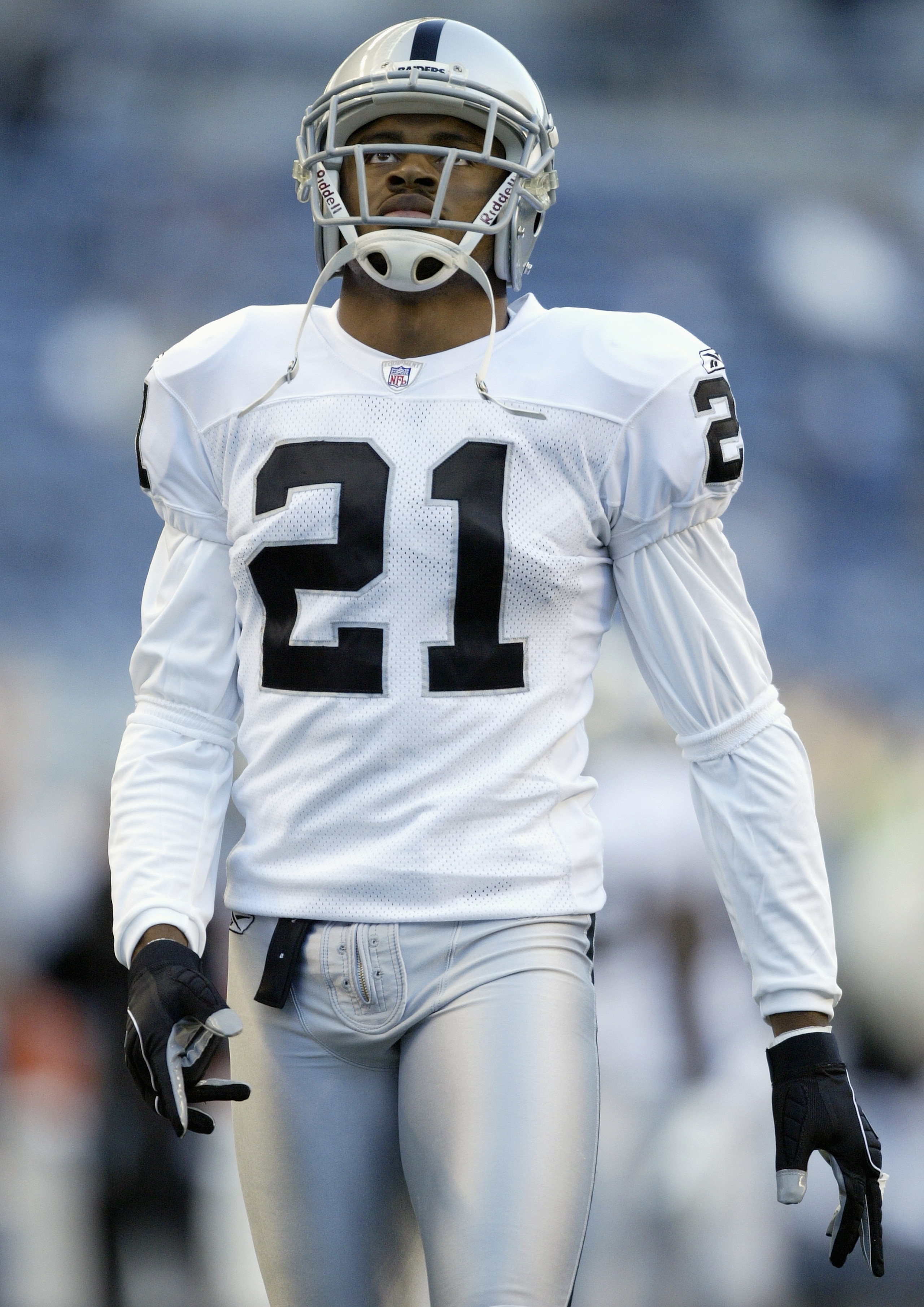SEATTLE - AUGUST 31:  Nnamdi Asomugha #21 of the Oakland Raiders stands on the field during the game with the Seattle Seahawks on August 31, 2006 at Qwest Field in Seattle Washington. The Seahawks won 30-7. (Photo by Otto Greule Jr/Getty Images)