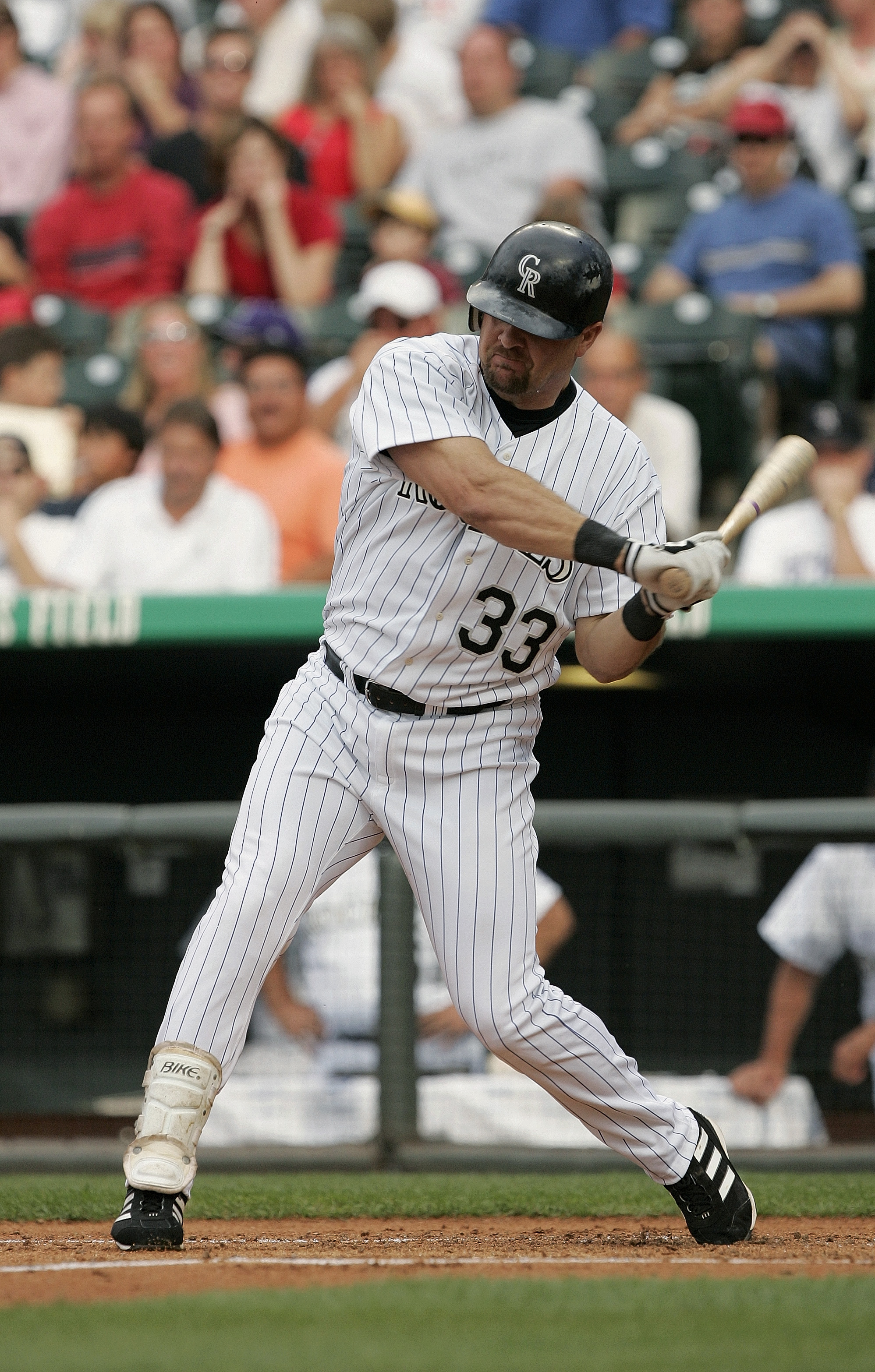 DENVER - JULY 3:  Outfielder Larry Walker #33 of the Colorado Rockies swings at a Detroit Tigers pitch during the interleague game at Coors Field on July 3, 2004 in Denver, Colorado.  The Rockies defeated the Tigers 11-6.  (Photo by Brian Bahr/Getty Image