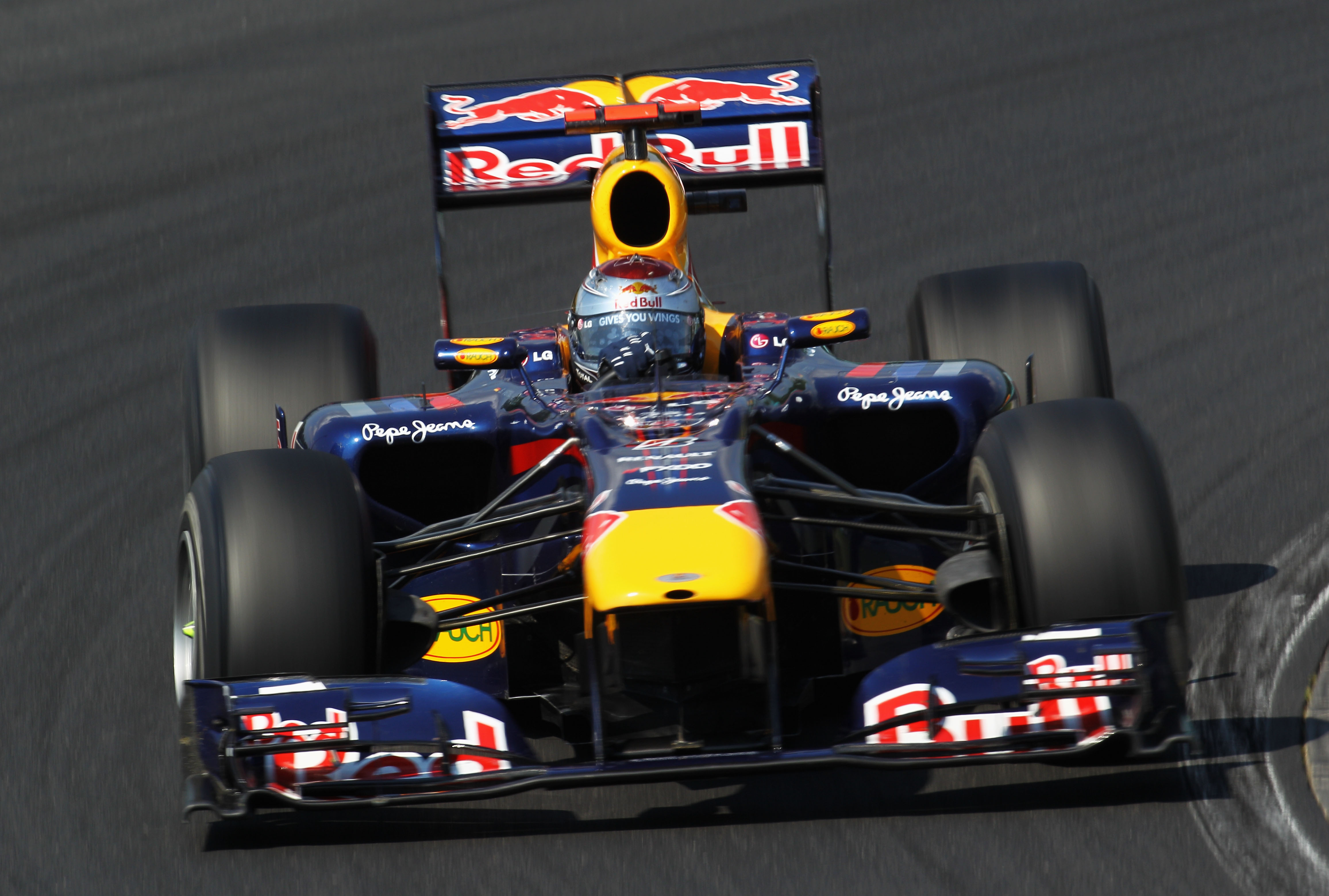 BUDAPEST, HUNGARY - AUGUST 01:  Sebastian Vettel of Germany and Red Bull Racing drives during the Hungarian Formula One Grand Prix at the Hungaroring on August 1, 2010 in Budapest, Hungary.  (Photo by Paul Gilham/Getty Images)