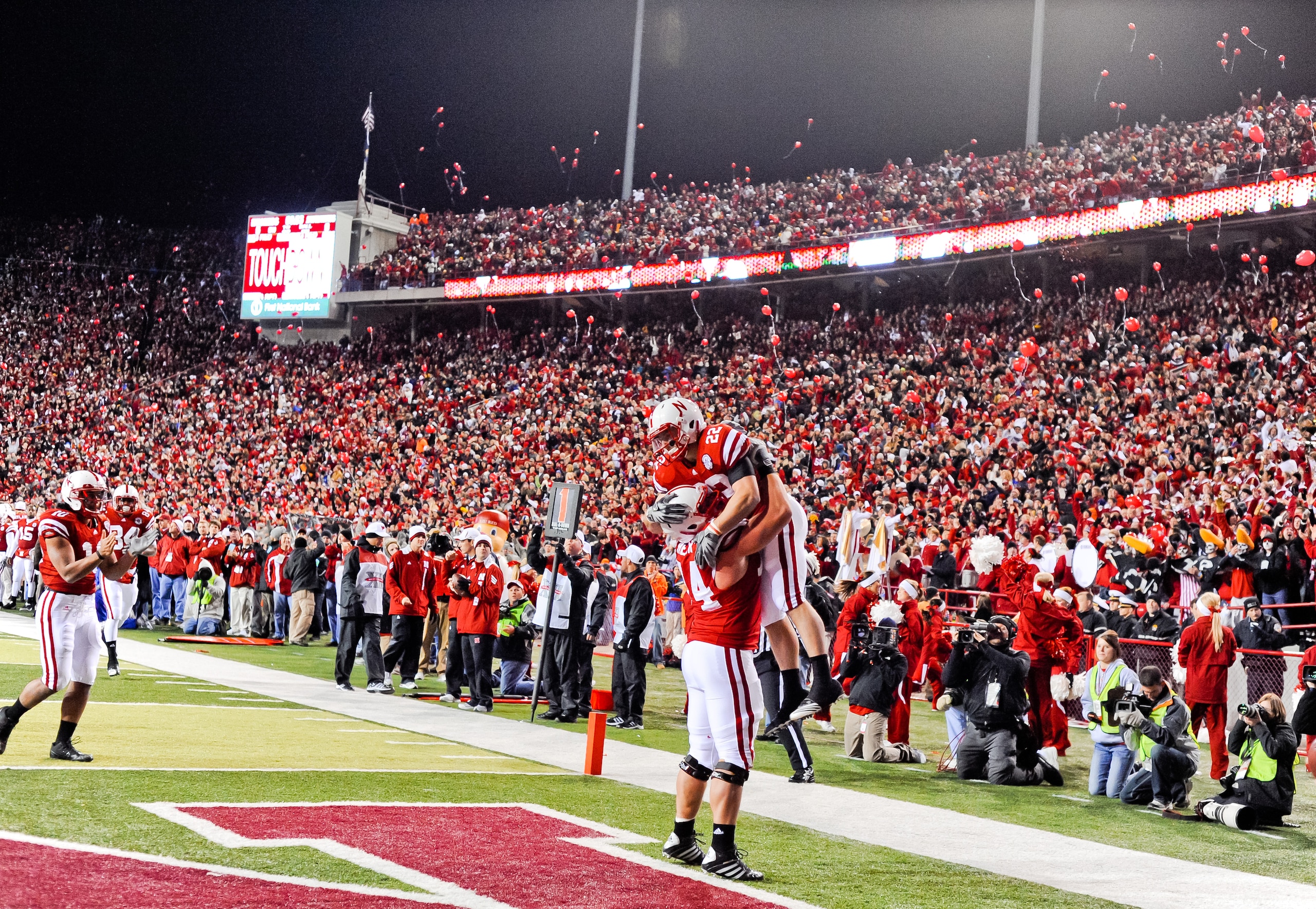LINCOLN, NE - NOVEMBER 13: Rex Burkhead #22 and Ricky Henry #74 of the Nebraska Cornhuskers celebrate after a touchdown during their game against the Kansas Jayhawks at Memorial Stadium on November 13, 2010 in Lincoln, Nebraska. Nebraska Defeated Kansas 2 LINCOLN, NE - NOVEMBER 13: Rex Burkhead #22 and Ricky Henry #74 of the Nebraska Cornhuskers celebrate after a touchdown during their game against the Kansas Jayhawks at Memorial Stadium on November 13, 2010 in Lincoln, Nebraska. Nebraska Defeated Kansas 2