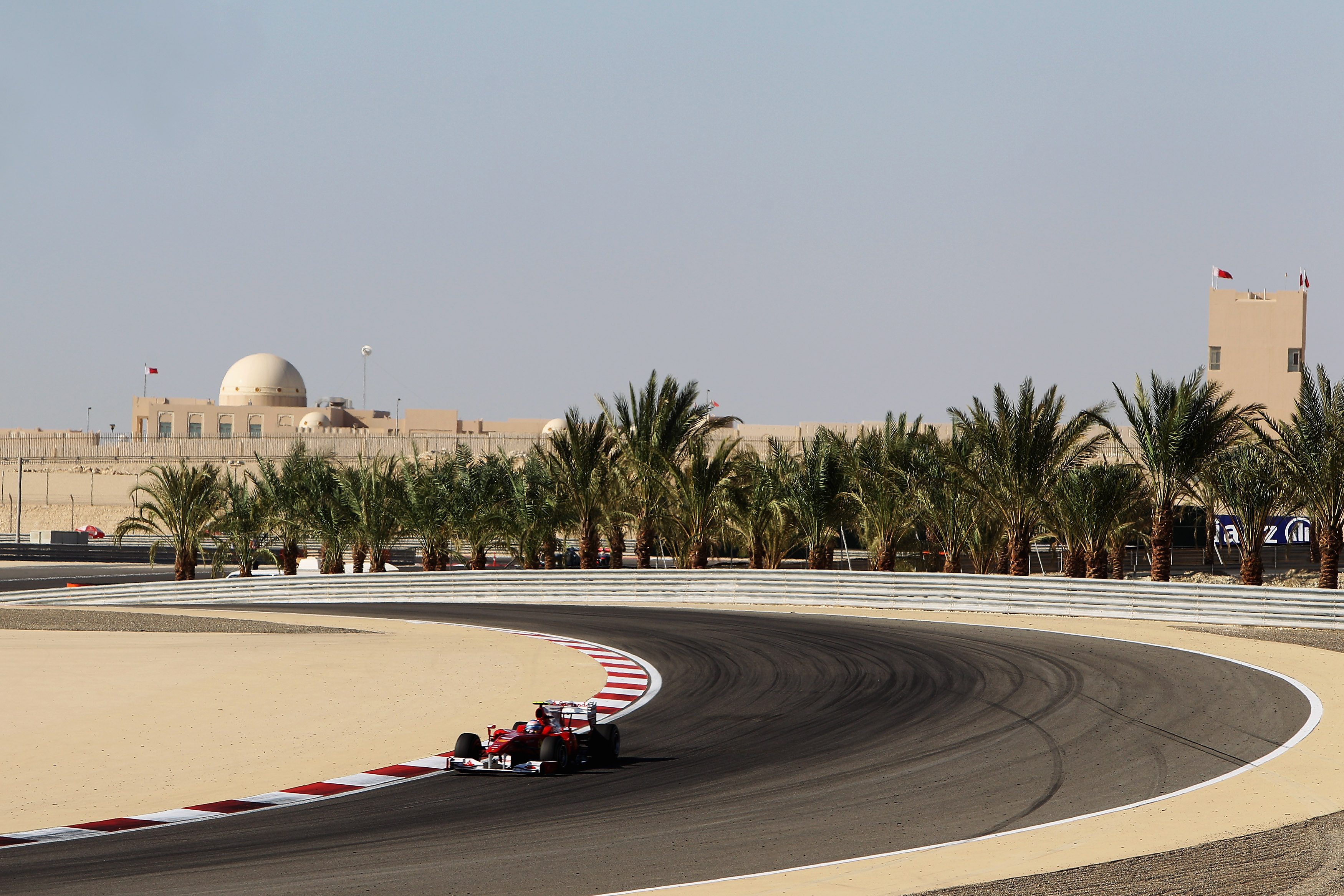 SAKIR, BAHRAIN - MARCH 14:  Fernando Alonso of Spain and Ferrari drives during the Bahrain Formula One Grand Prix at the Bahrain International Circuit on March 14, 2010 in Sakir, Bahrain.  (Photo by Mark Thompson/Getty Images)