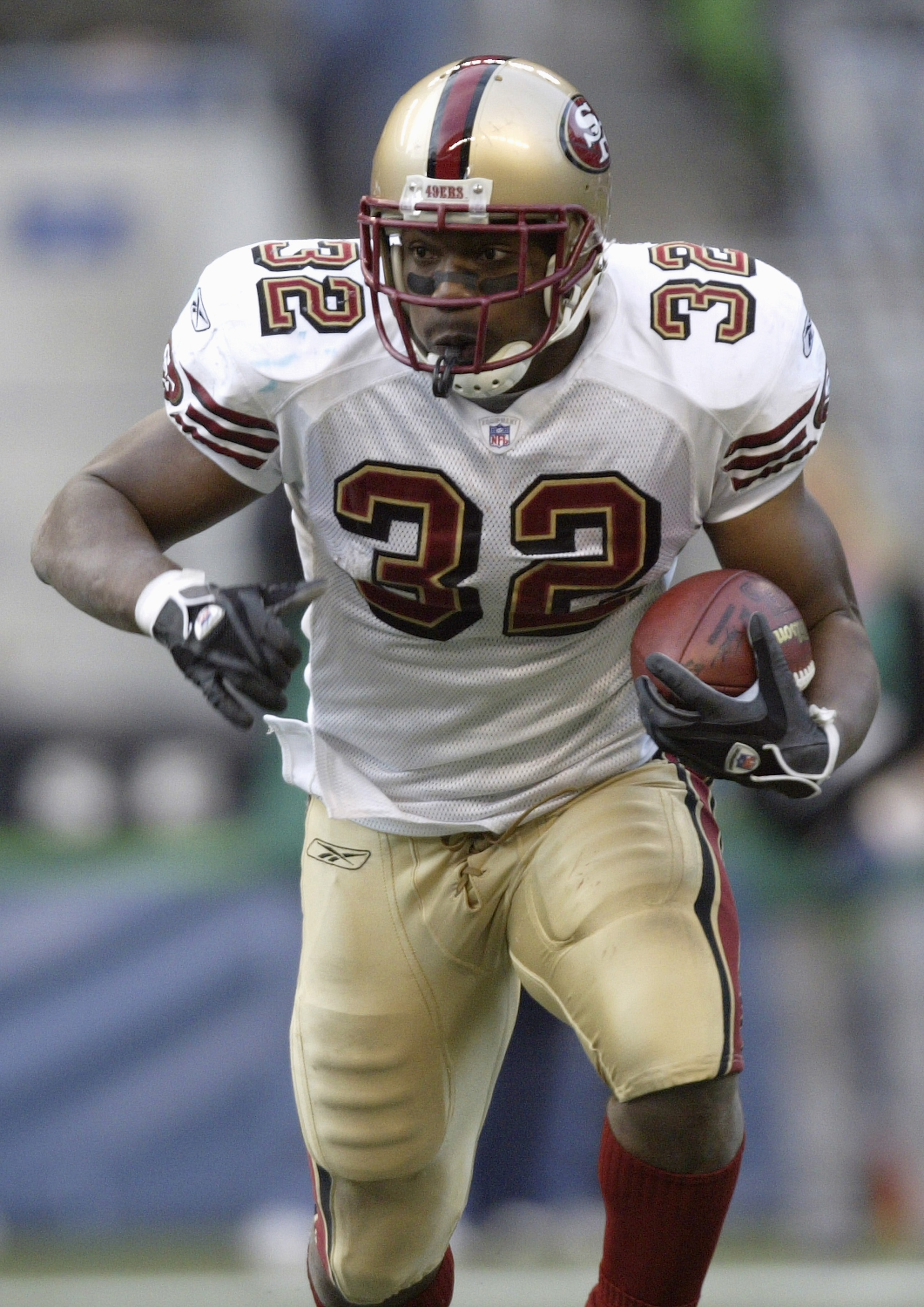 SEATTLE - DECEMBER 11:  Kevan Barlow #34 of the San Francisco 49ers carries the ball during the game with the Seattle Seahawks on December 11, 2005 at Qwest Field in Seattle, Washington. The Seahawks won 41-3. (Photo by Otto Greule Jr/Getty Images)
